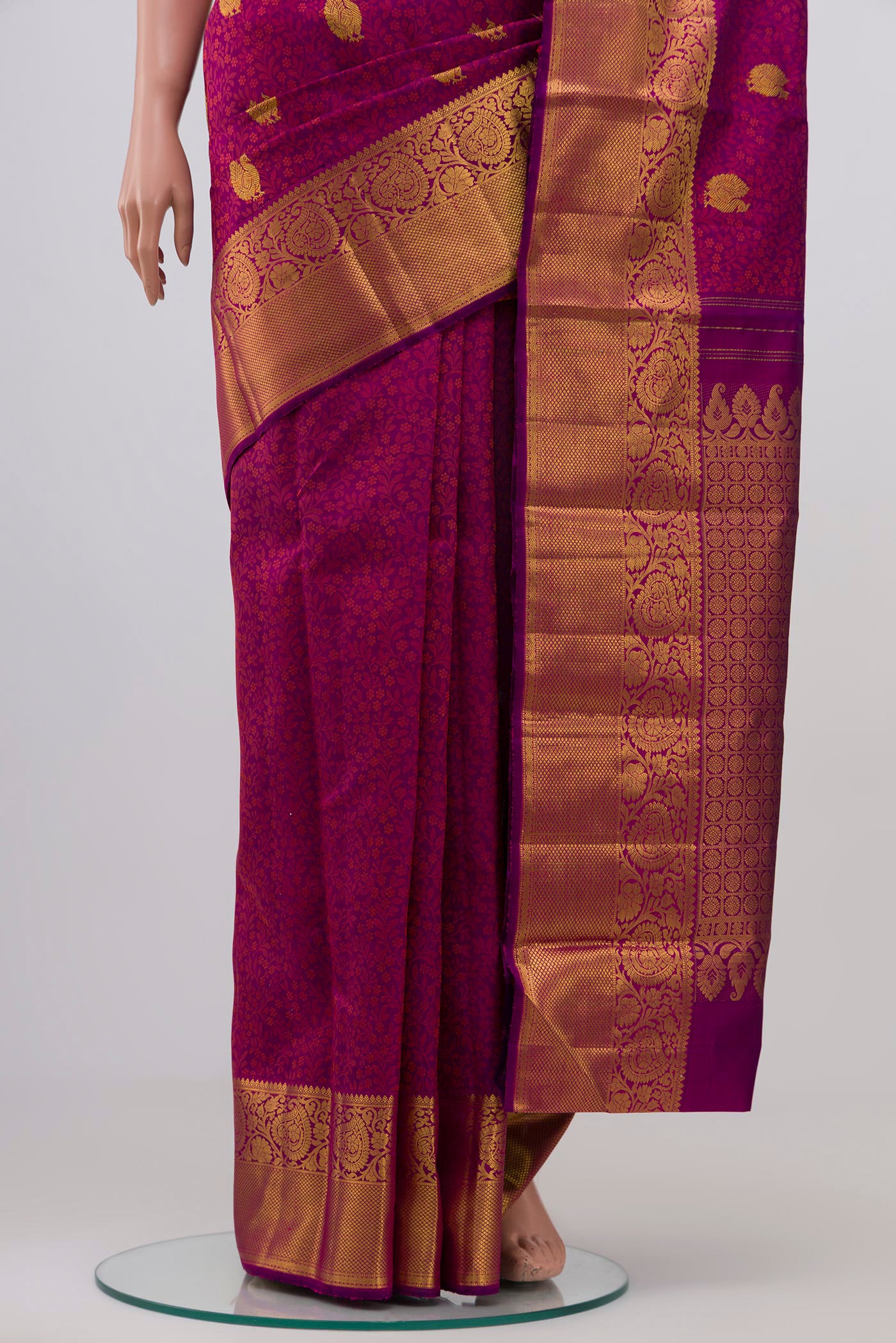 Pleats and pallu of Purple Kanjivaram Silk Saree with Jacquard With Zari Butta on the body and Zari Border. 