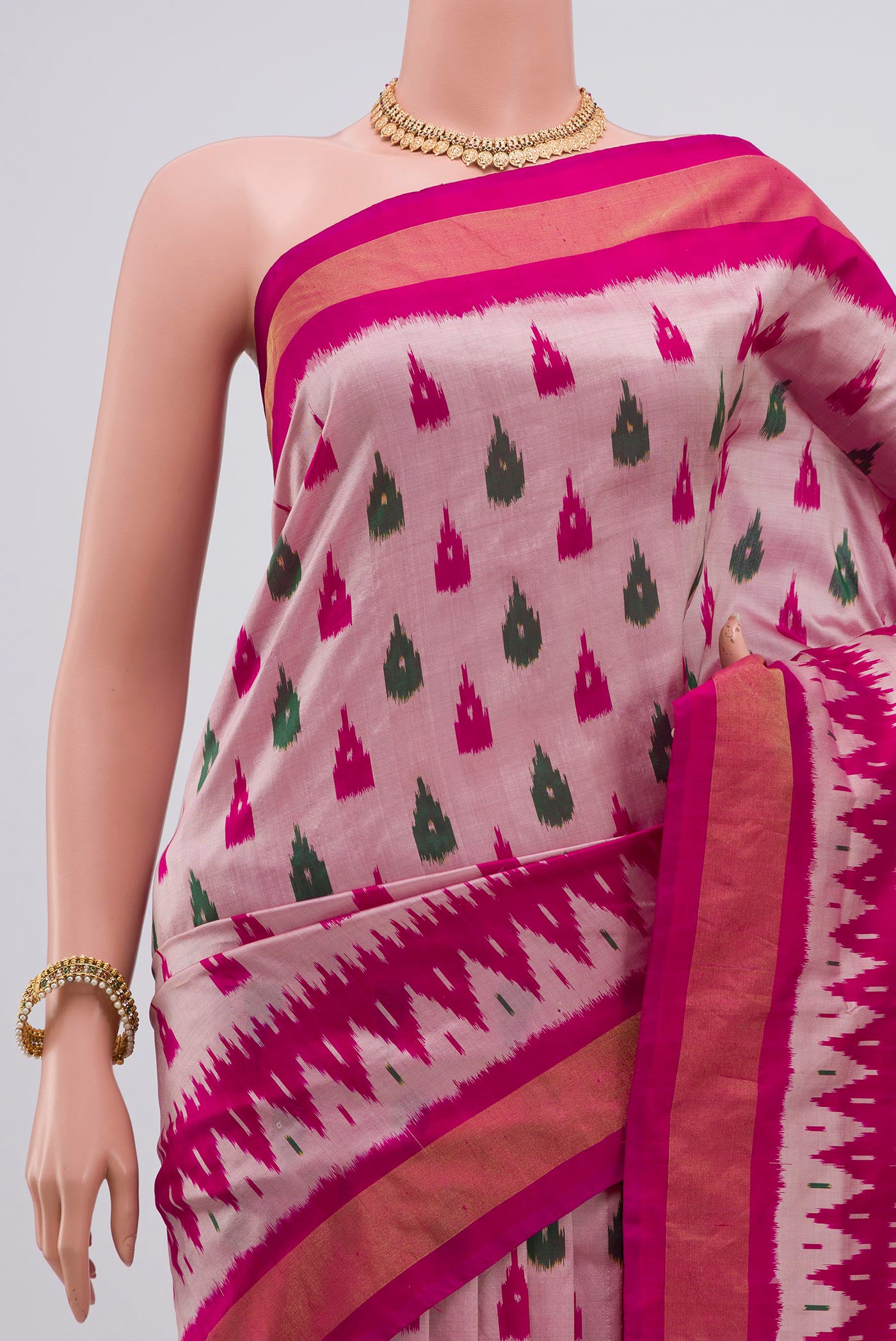 Border image of Rose pink Pochampally Silk Saree with Ikat Print on the body and Zari Border. 