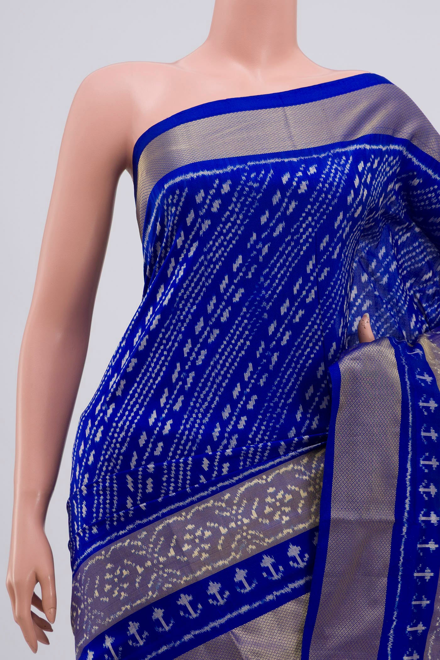 Border image of Blue Pochampally Silk Saree with Ikat Print on the body and Zari Border. 