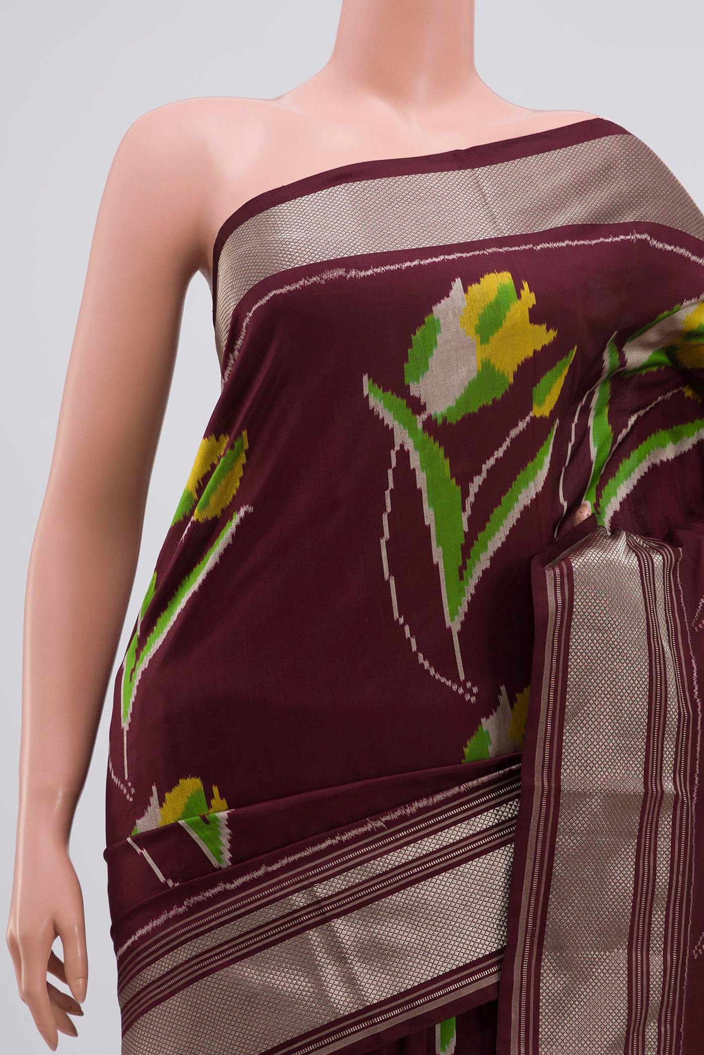 Border image of Brown Pochampally Silk Saree with Ikat Print on the body and Zari Border. 