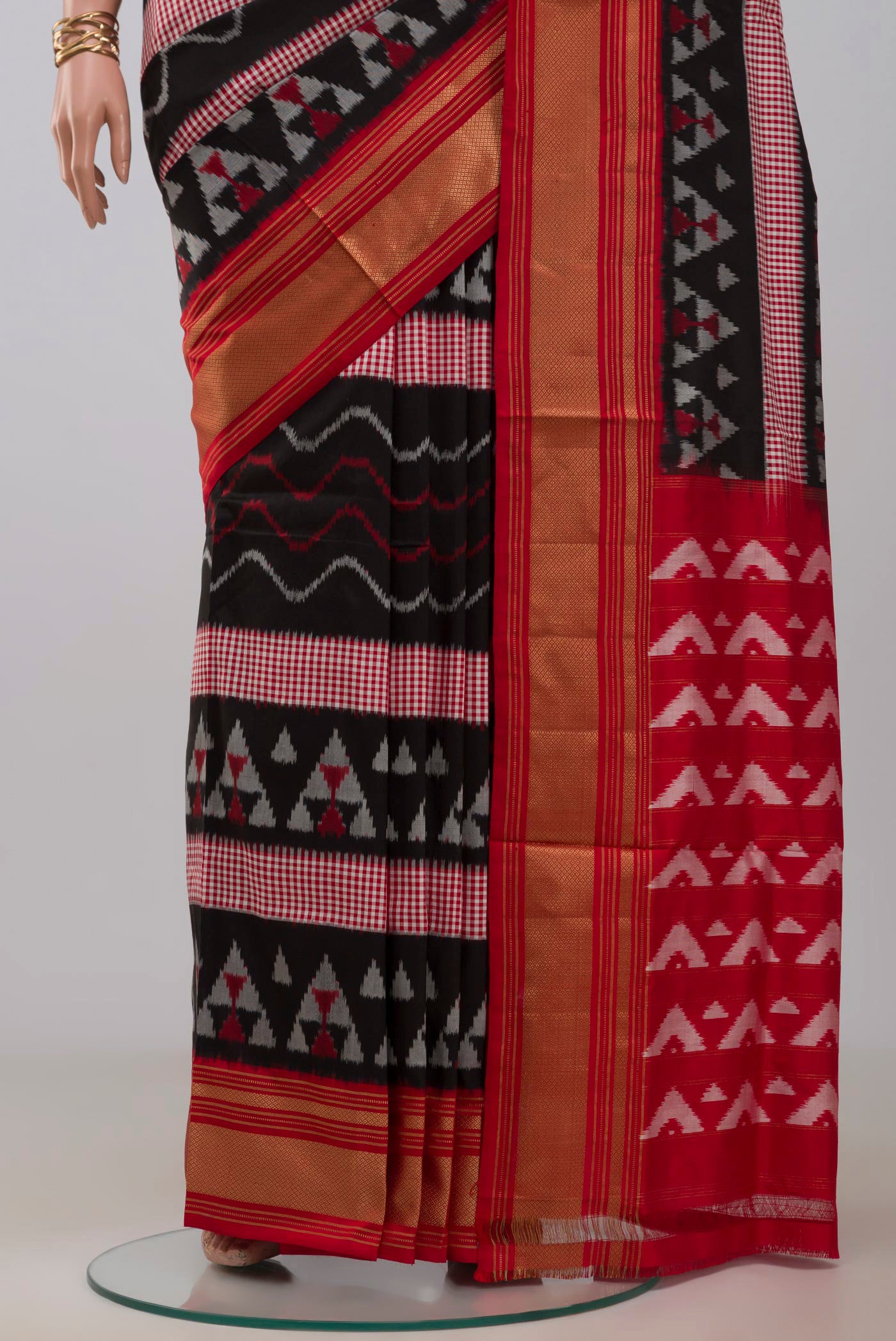 Pleats and pallu of Black Pochampally Silk Saree with Pure Ikat on the body and Zari Border. 