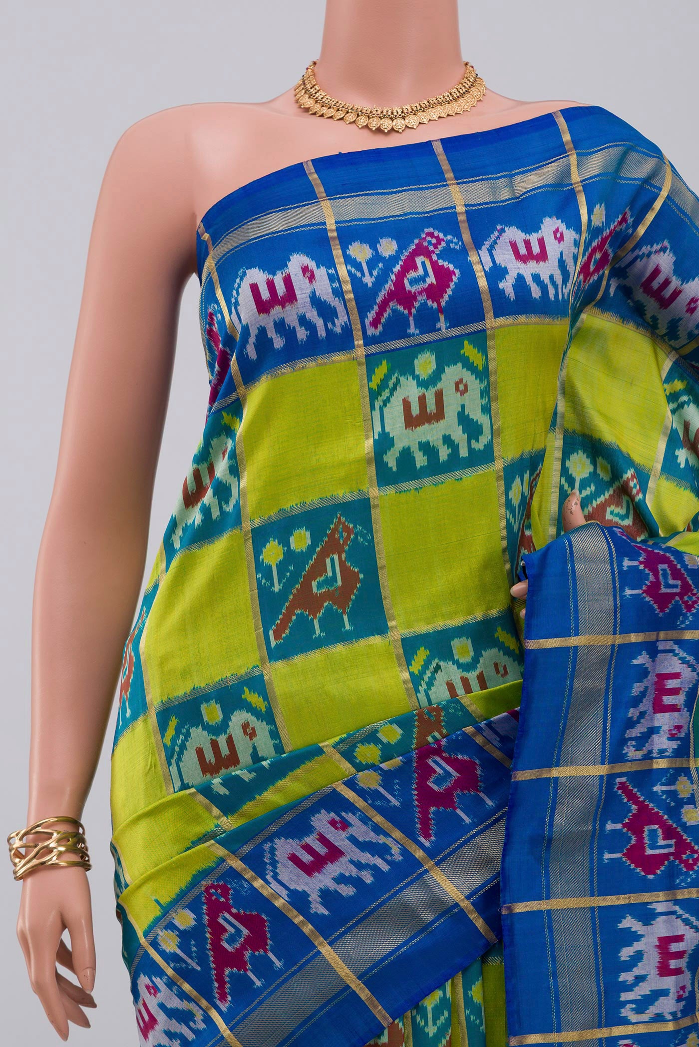 Border image of Green Pochampally Silk Saree with Ikat design on the body and Zari Border. 