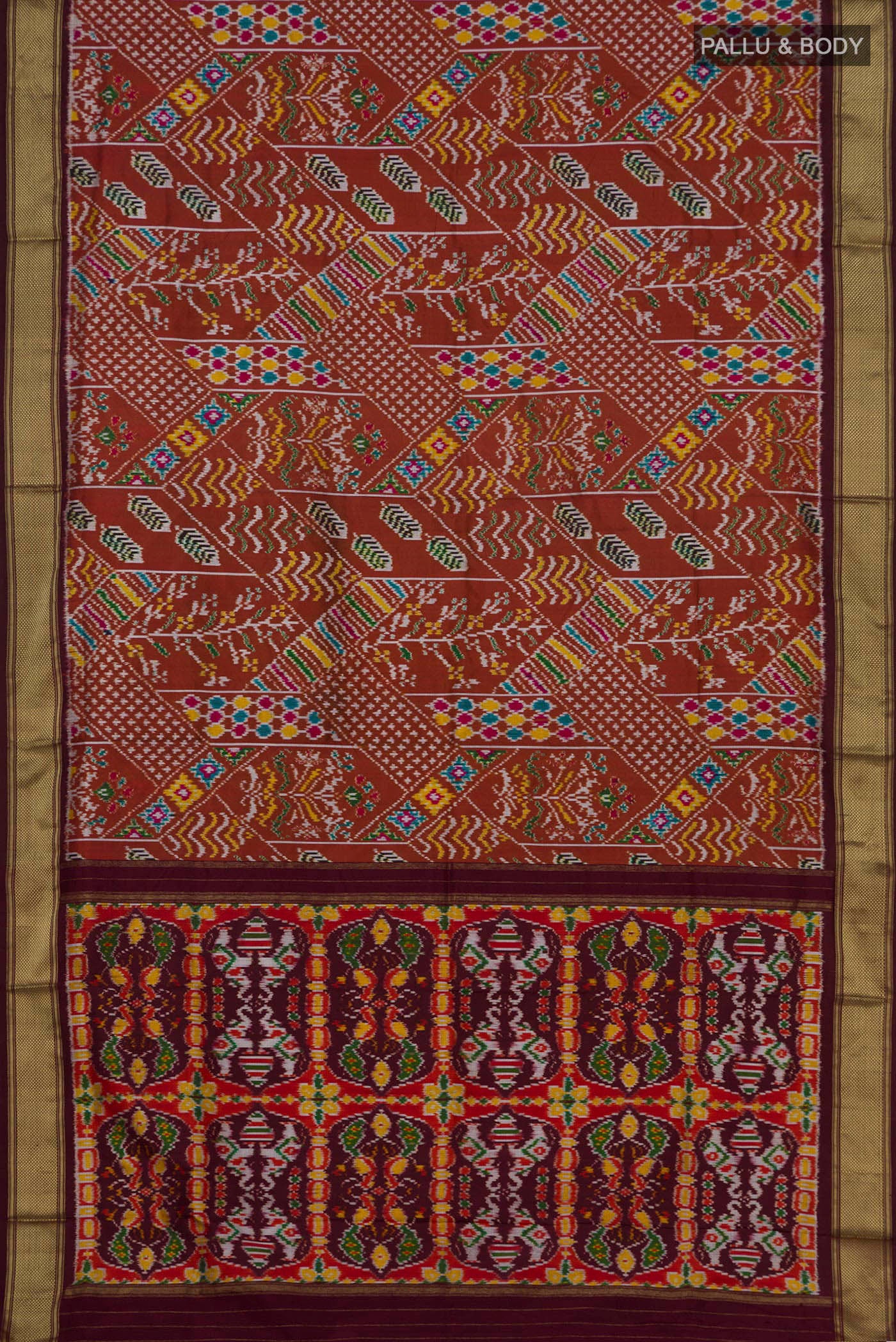 Flat view of Brown Pochampally Silk Saree with Ikat Print on the body and Zari Border. 