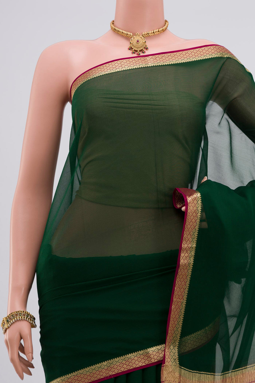 Border image of Green Chiffon Saree with Plain Body and Zari Border. 