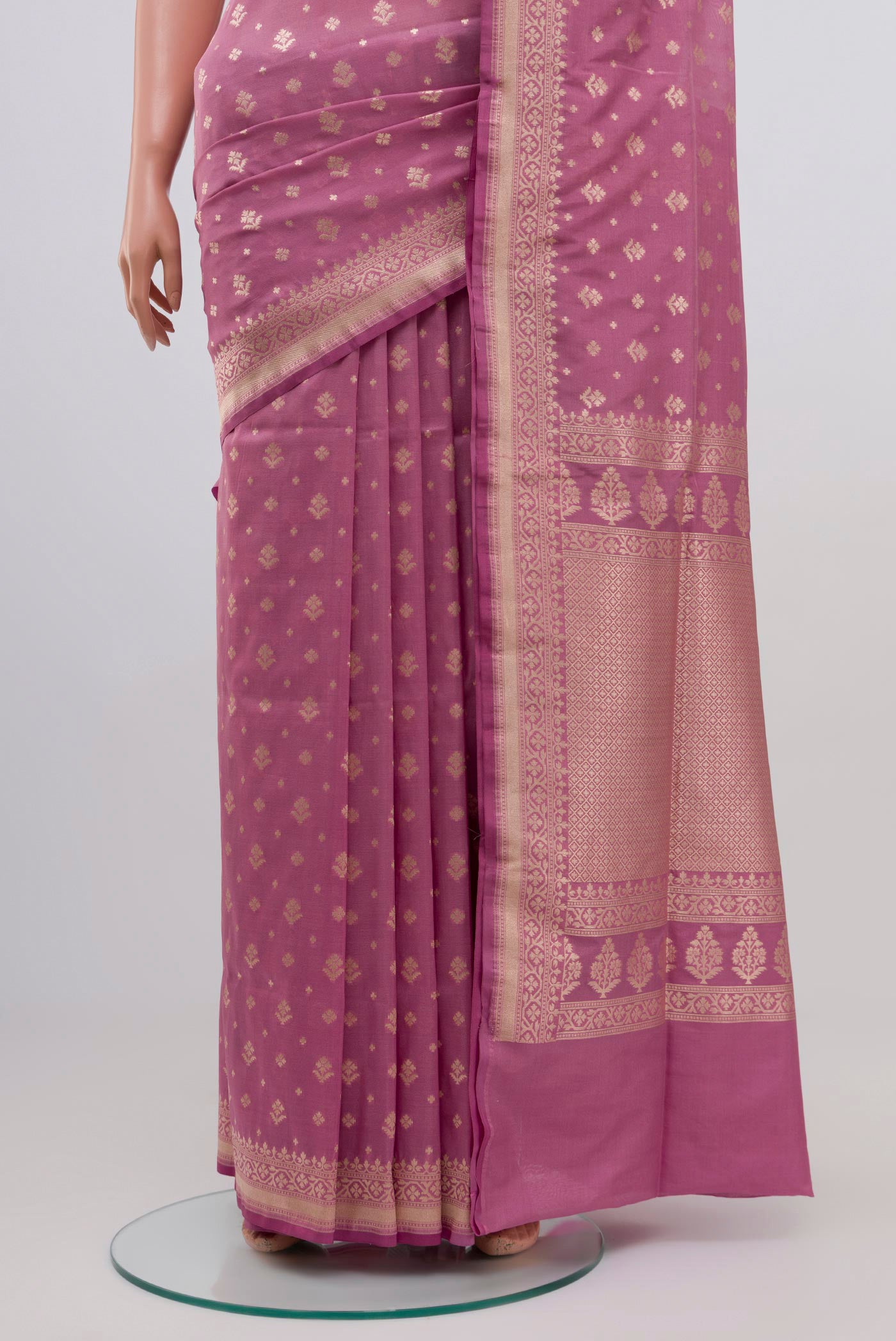Pleats and pallu of Pink Banarasi Silk Saree with Zari Butta on the body and Zari Border. 