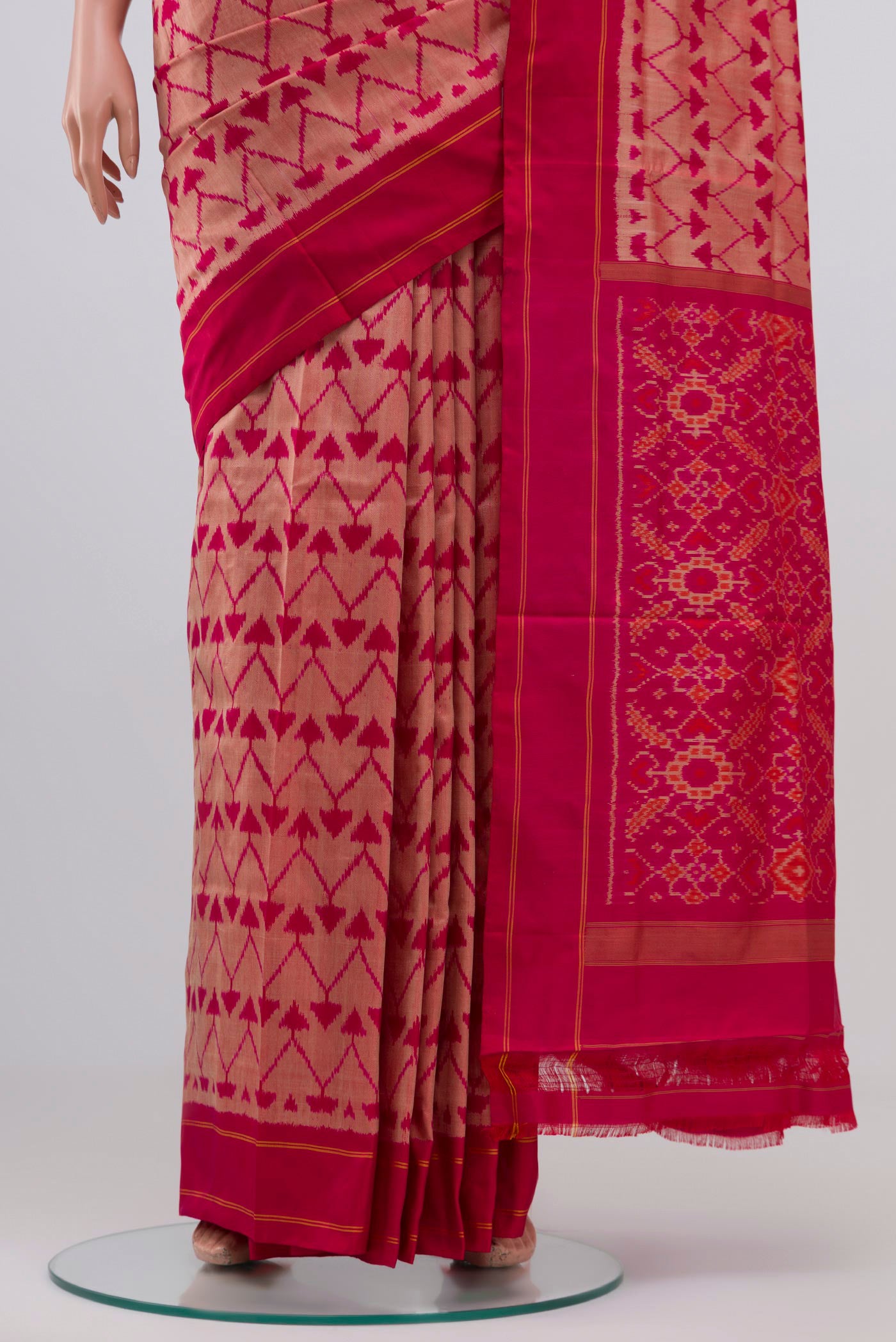 Pleats and pallu of Pink Pochampally Silk Saree with Ikat design on the body and Plain Border. 