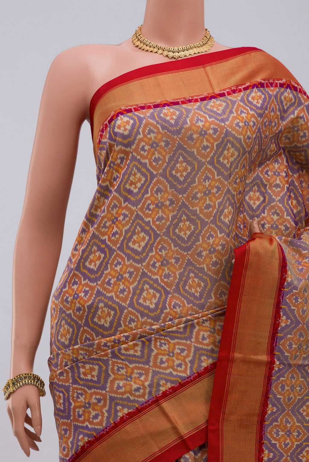 Border image of Blue Pochampally Saree with Ikat design on the body and Zari Border. 