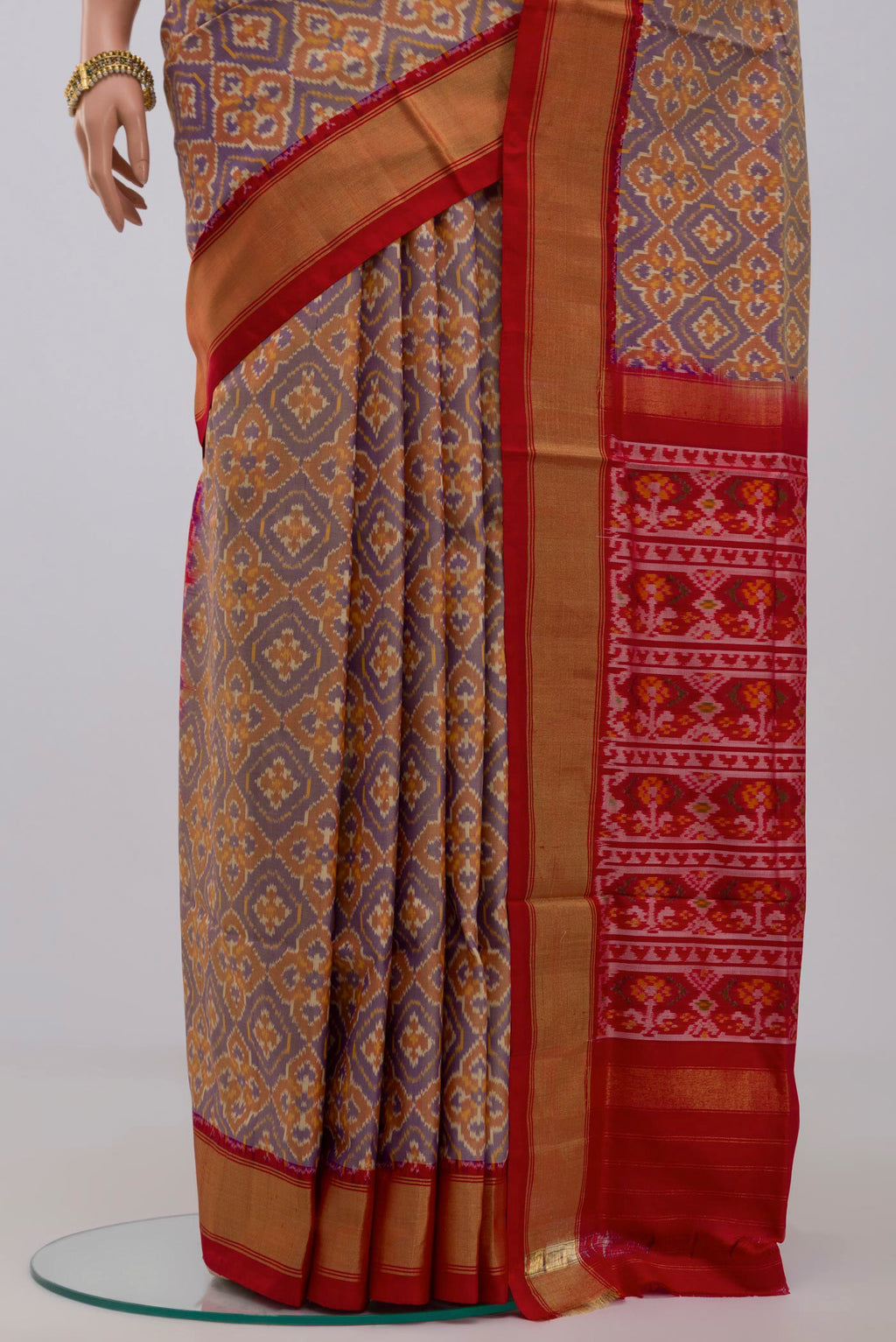 Pleats and pallu of Blue Pochampally Saree with Ikat design on the body and Zari Border. 