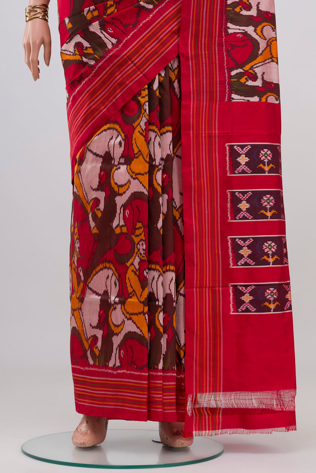 Pleats and pallu of Red Pochampally Silk Saree with Pure Ikat on the body and Plain Border. 