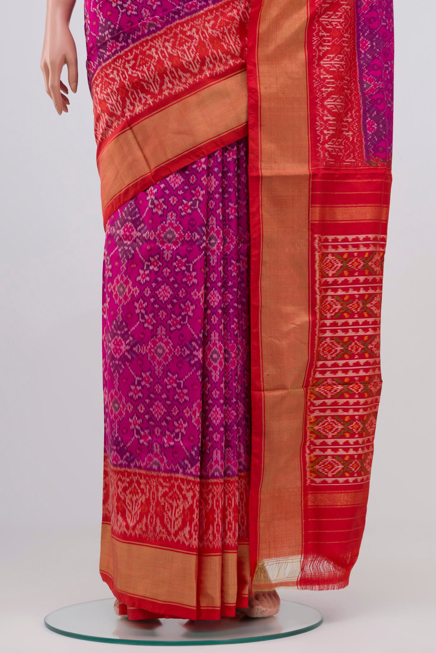 Pleats and pallu of Pink Pochampally Silk Saree with Ikat design on the body and Zari Border. 