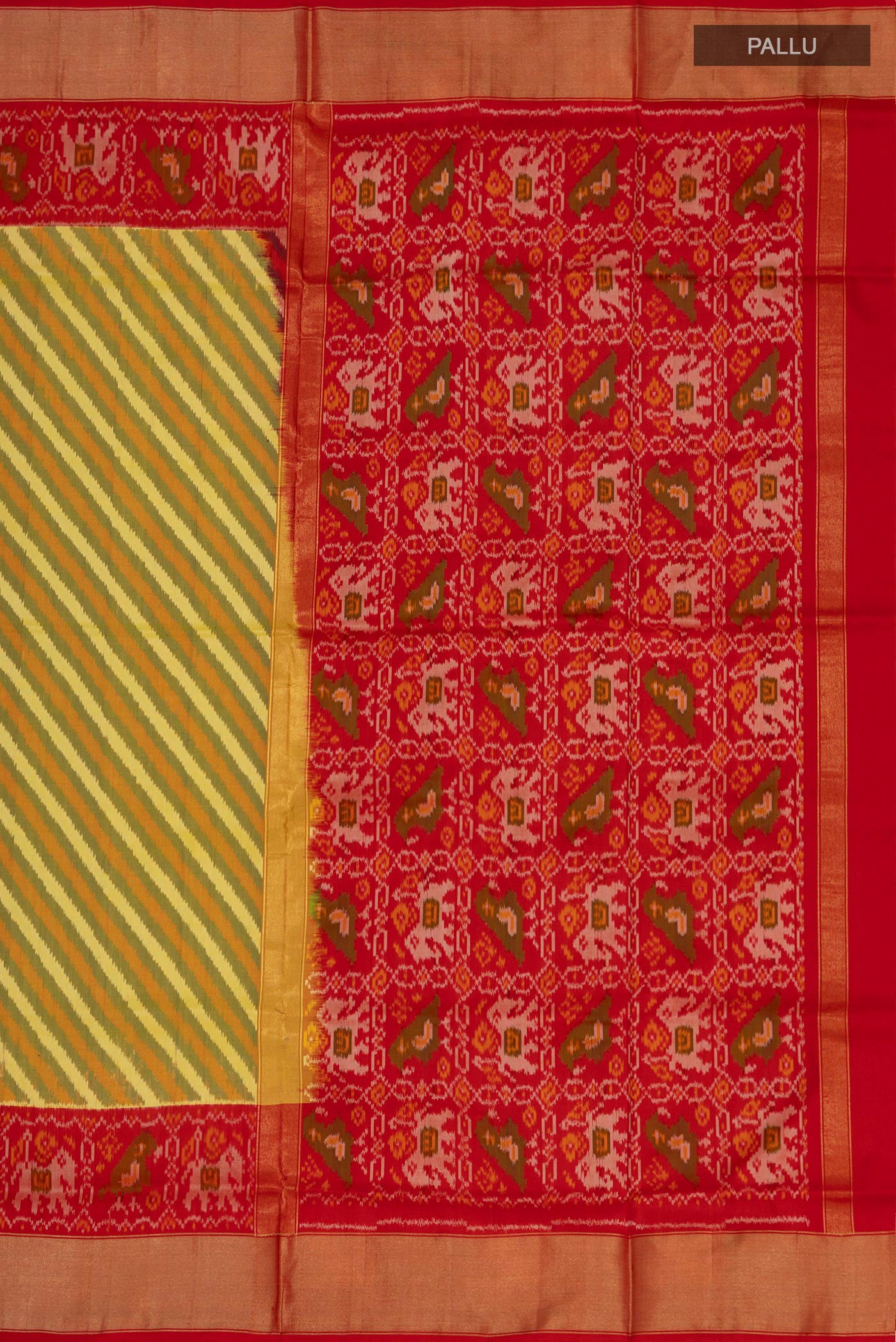 Close up image of the pallu of Green Pochampally Silk Saree with Ikat Print on the body and Zari Border. 