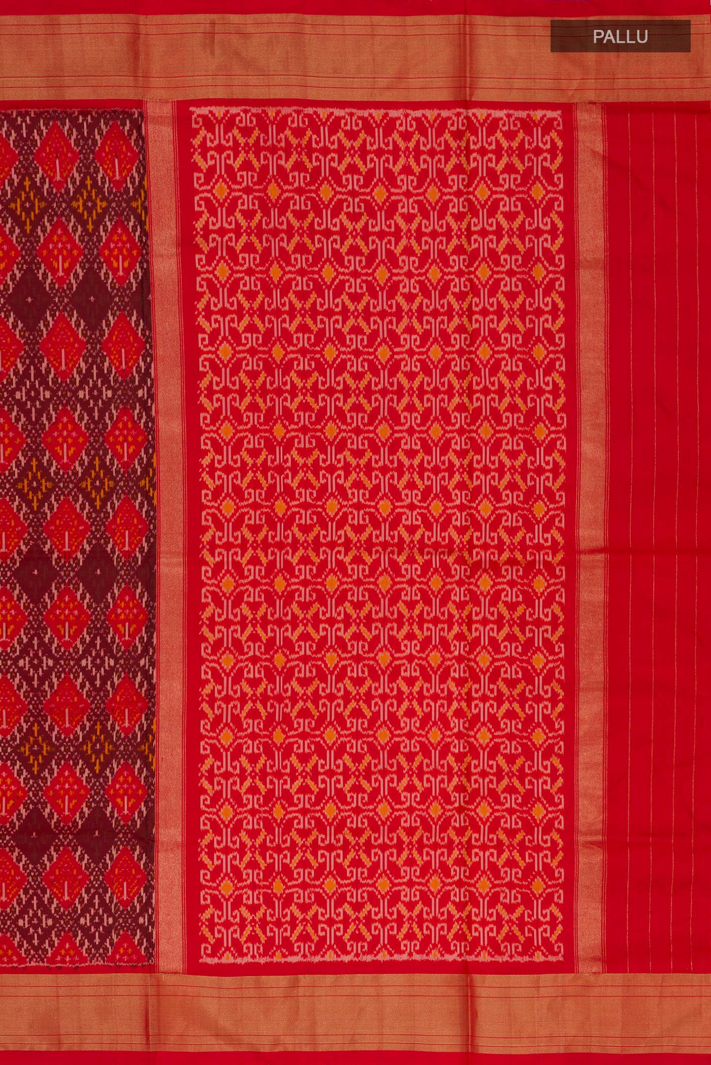 Close up image of the pallu of Orange Pochampally Silk Saree with Ikat design on the body and Zari Border. 