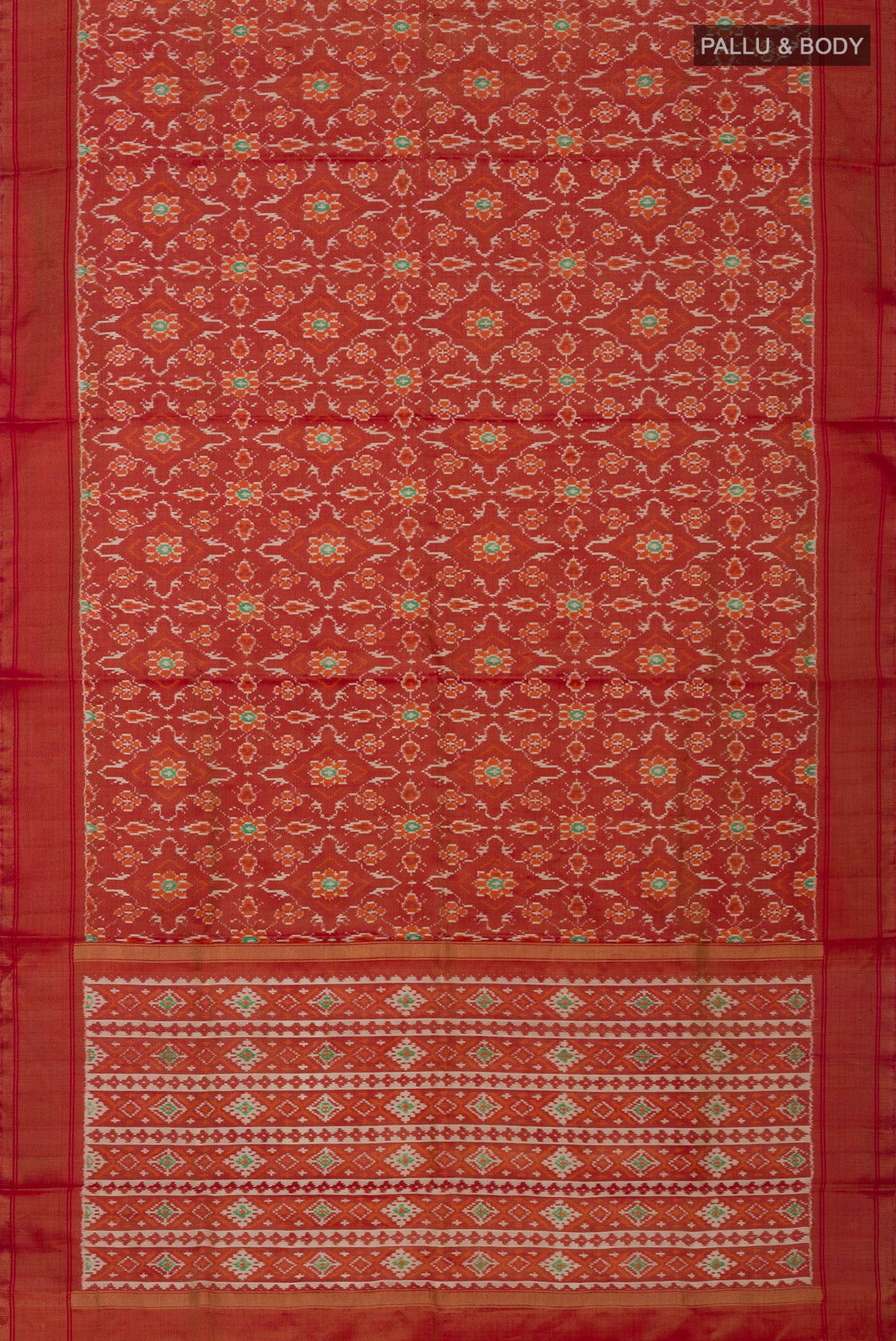 Flat view of Rust Pochampally Saree with Ikat design on the body and Zari Border. 