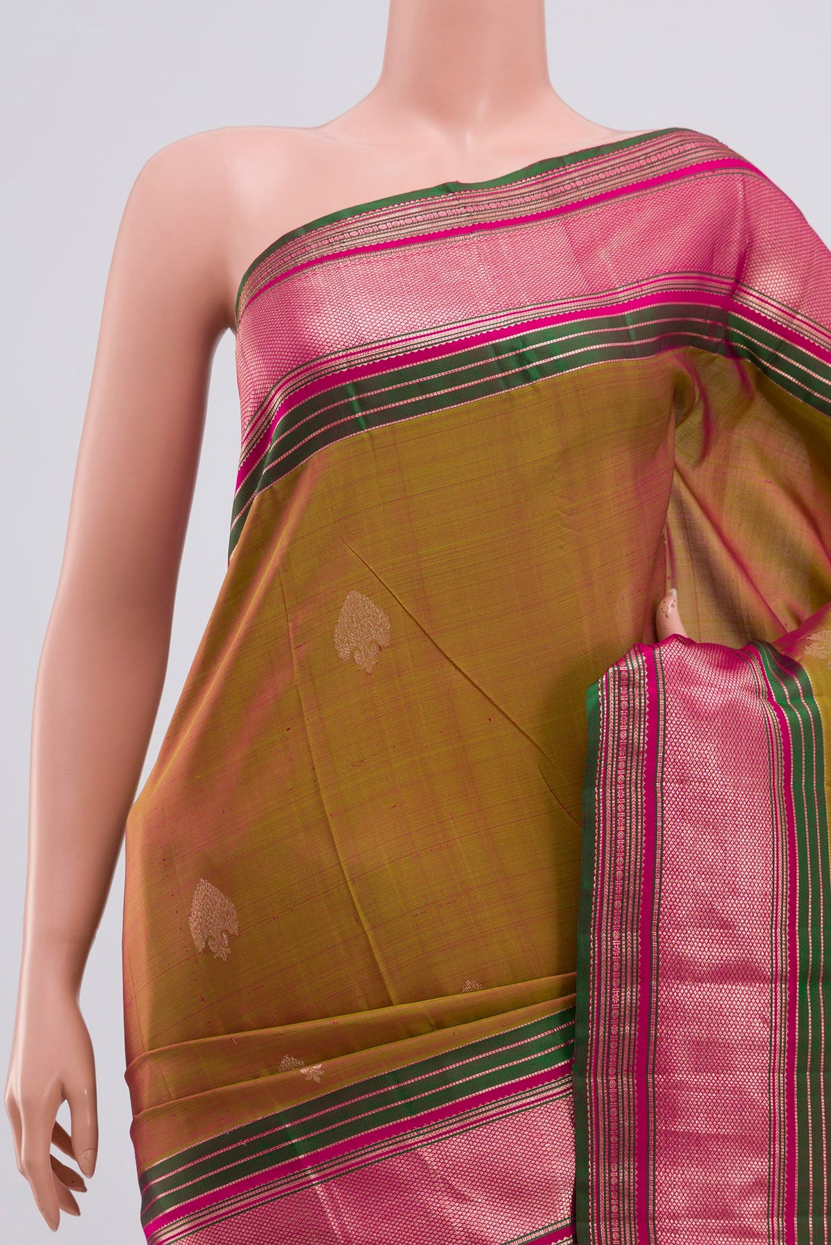 Border image of Green Kanjivaram Saree with Zari Butta on the body and Zari Border. 