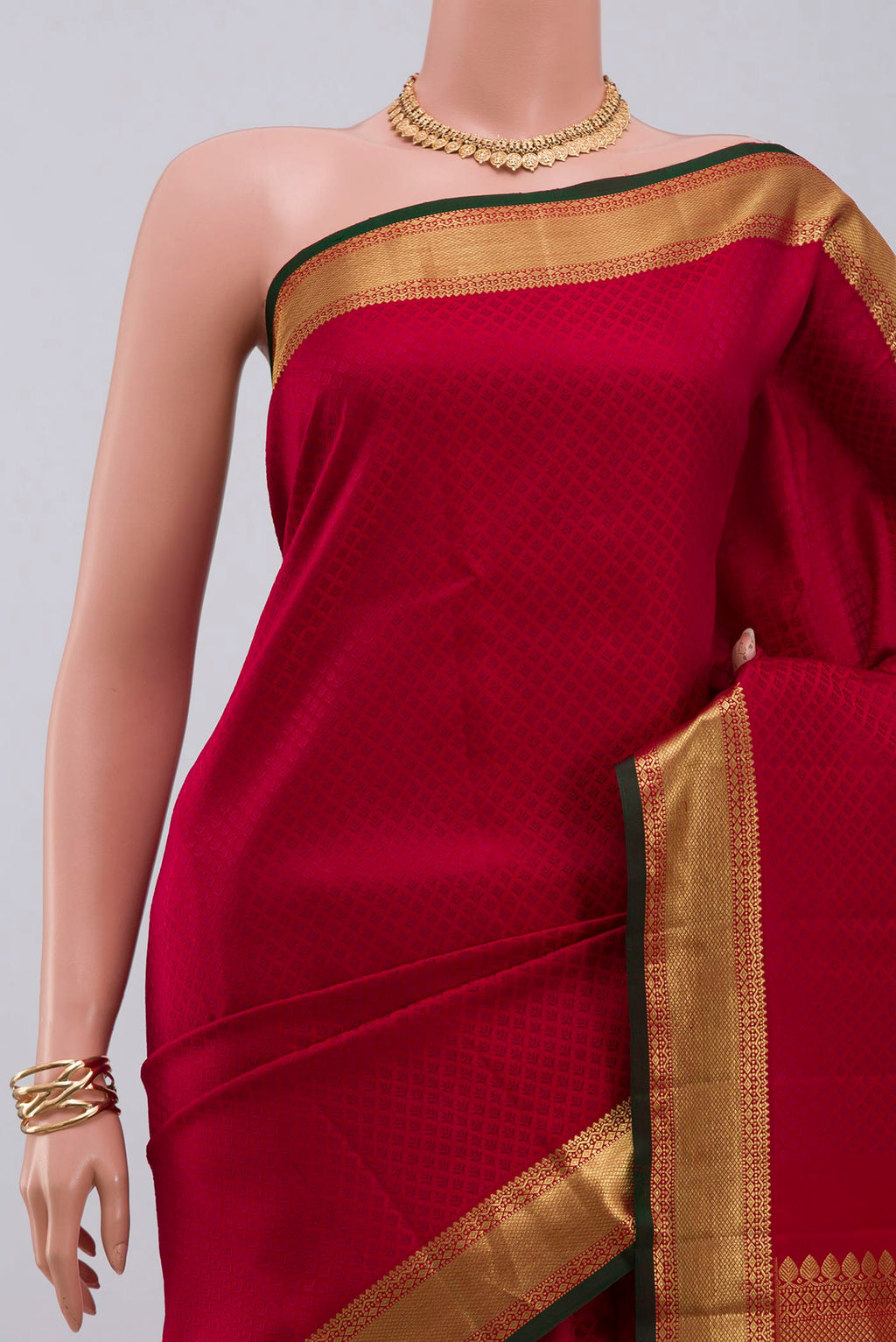 Border image of Red Kanjivaram Saree with Jacquard design on the body and Zari Border. 