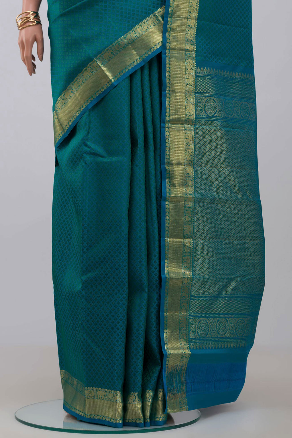 Pleats and pallu of Blue Kanjivaram Saree with Jacquard design on the body and Zari Border. 