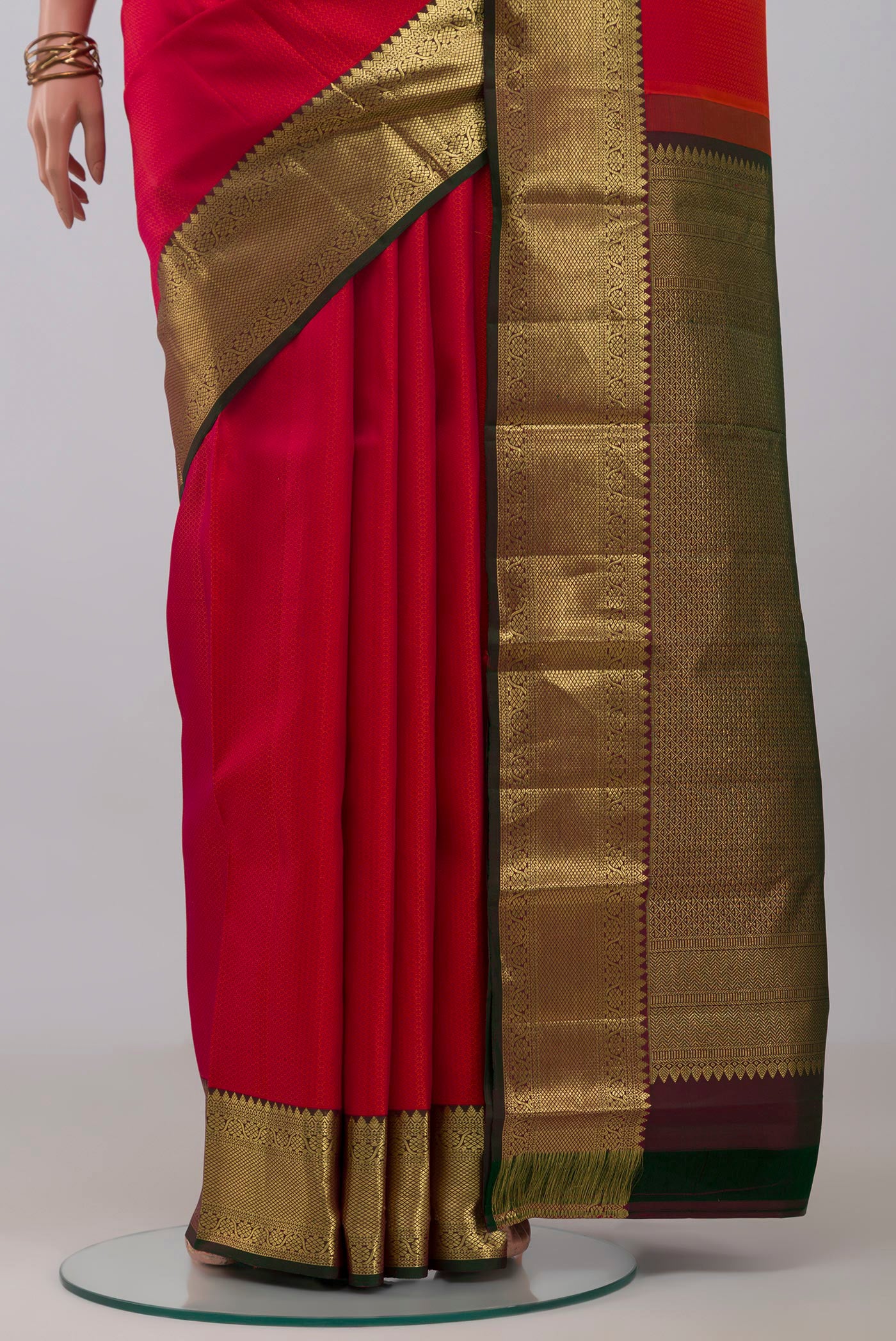 Pleats and pallu of Red Kanjivaram Silk Saree with Jacquard design on the body and Zari Border. 