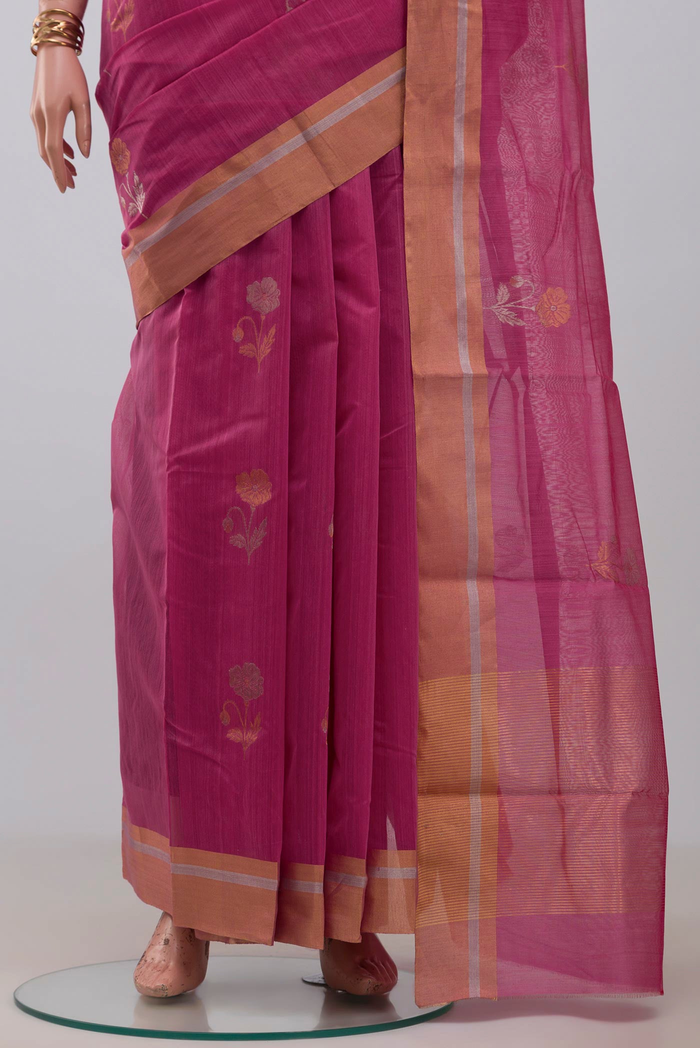 Pleats and pallu of Pink Chanderi Silk Cotton Saree with Zari Butta on the body and Zari Border. 