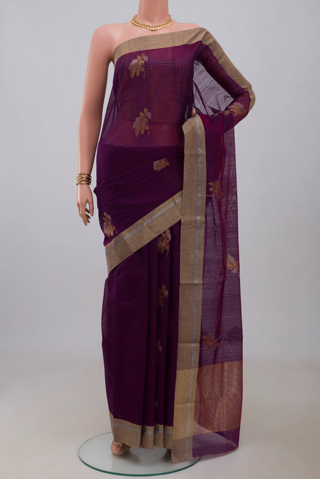 Purple Chanderi Silk Cotton Saree with Zari Butta on the body and Zari Border.  displayed on a mannequin