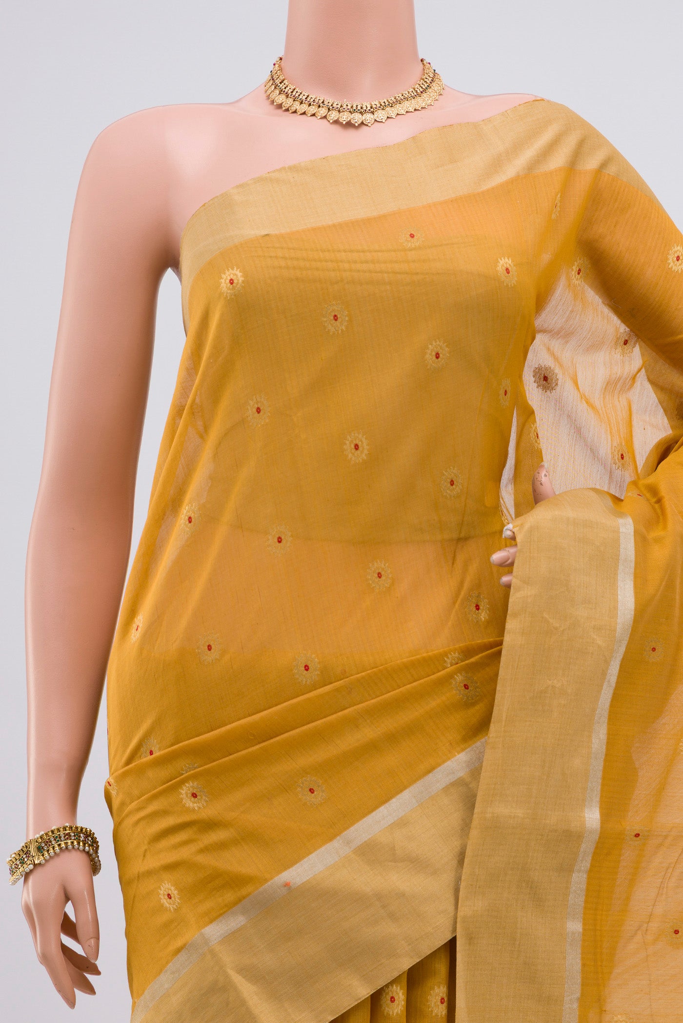 Border image of Yellow Chanderi Silk Cotton Saree with Zari Butta on the body and Zari Border. 