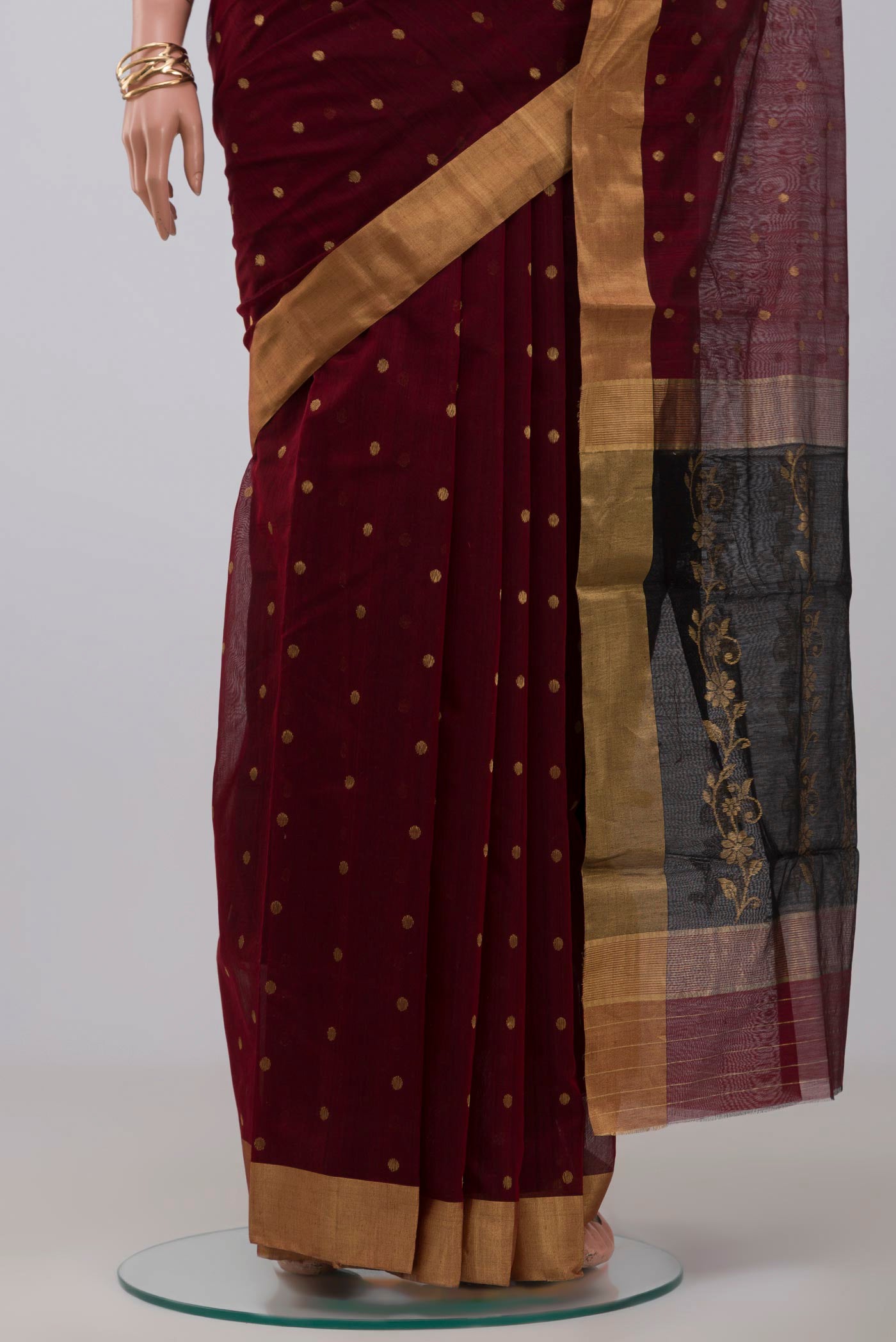 Pleats and pallu of Maroon Chanderi Silk Cotton Saree with Zari Butta on the body and Zari Border. 