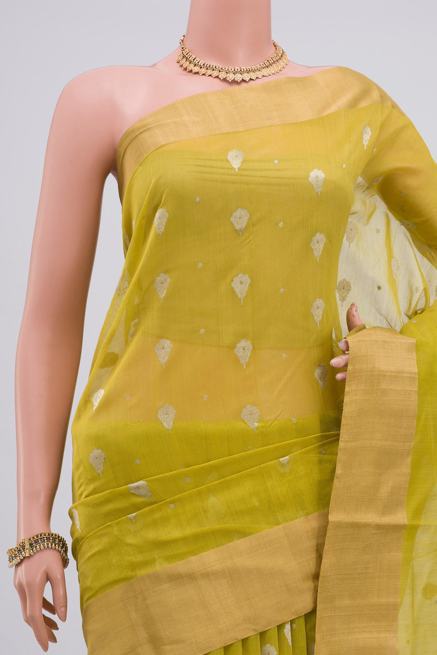 Border image of Lemon Yellow Chanderi Silk Cotton Saree with Zari Butta on the body and Zari Border. 