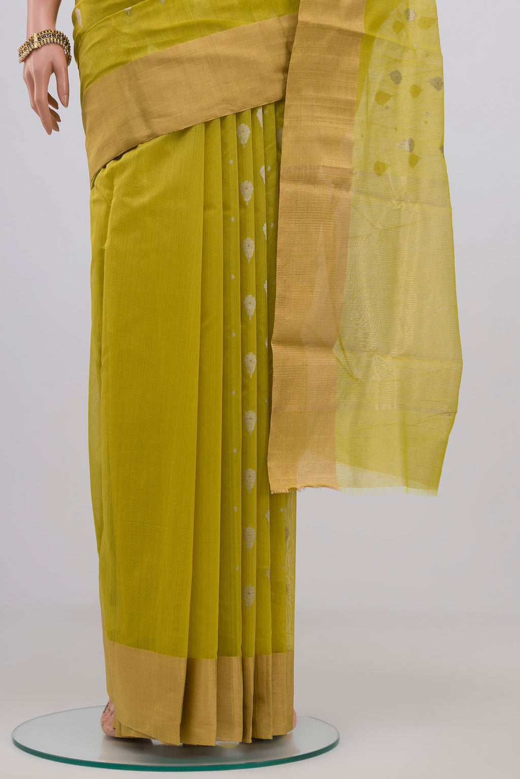 Pleats and pallu of Lemon Yellow Chanderi Silk Cotton Saree with Zari Butta on the body and Zari Border. 