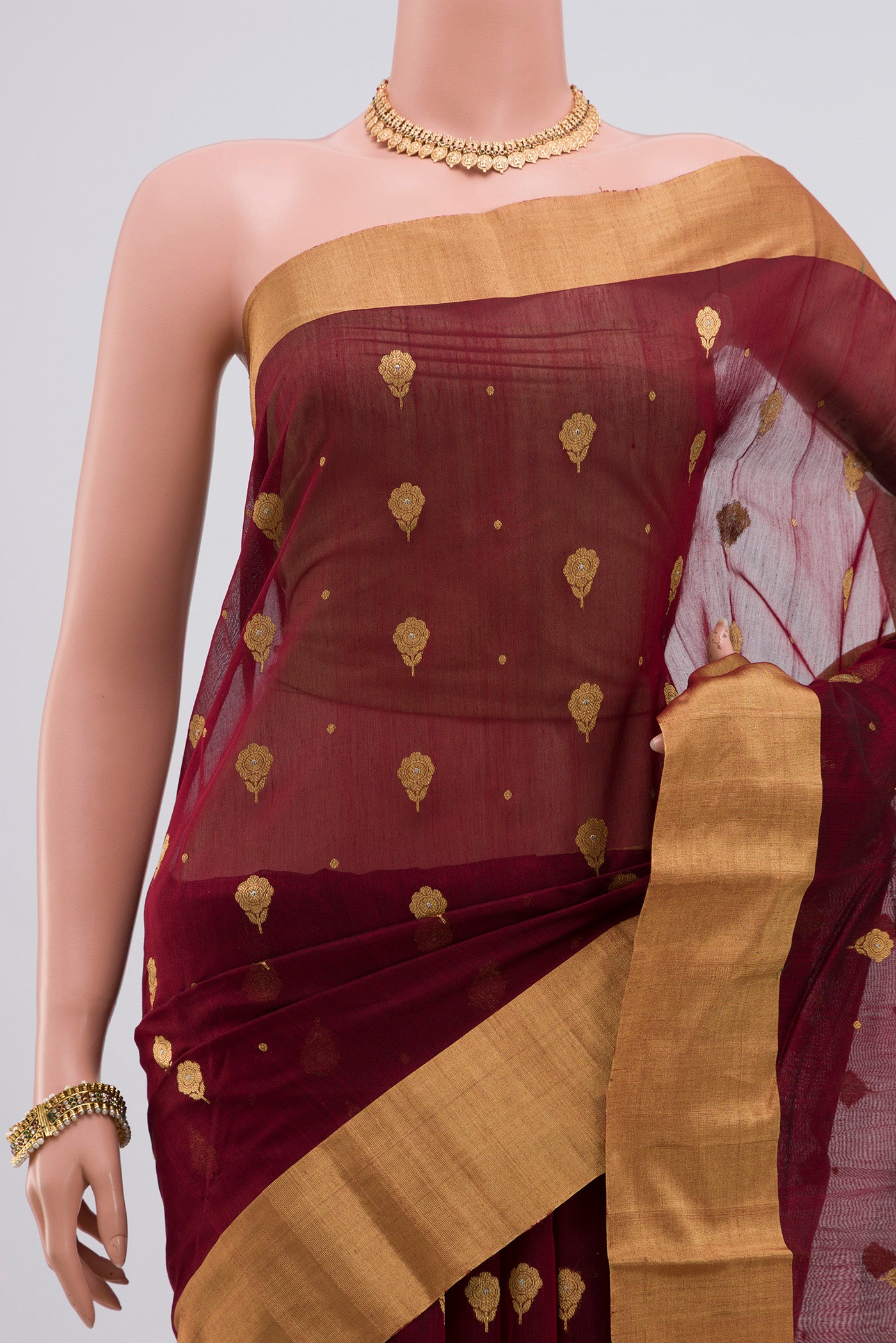 Border image of Maroon Chanderi Silk Cotton Saree with Zari Butta on the body and Zari Border. 
