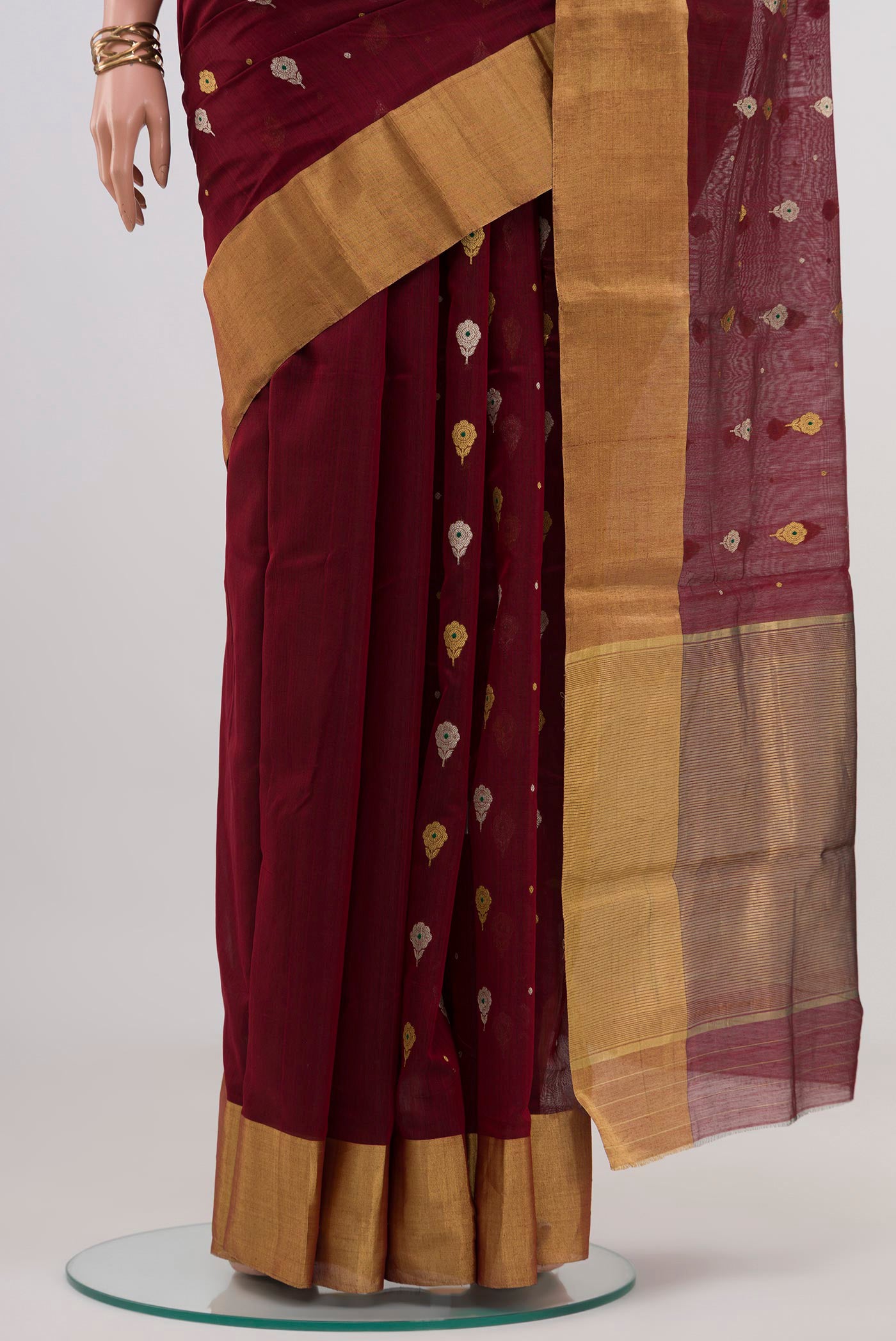 Pleats and pallu of Maroon Chanderi Silk Cotton Saree with Zari Butta on the body and Zari Border. 