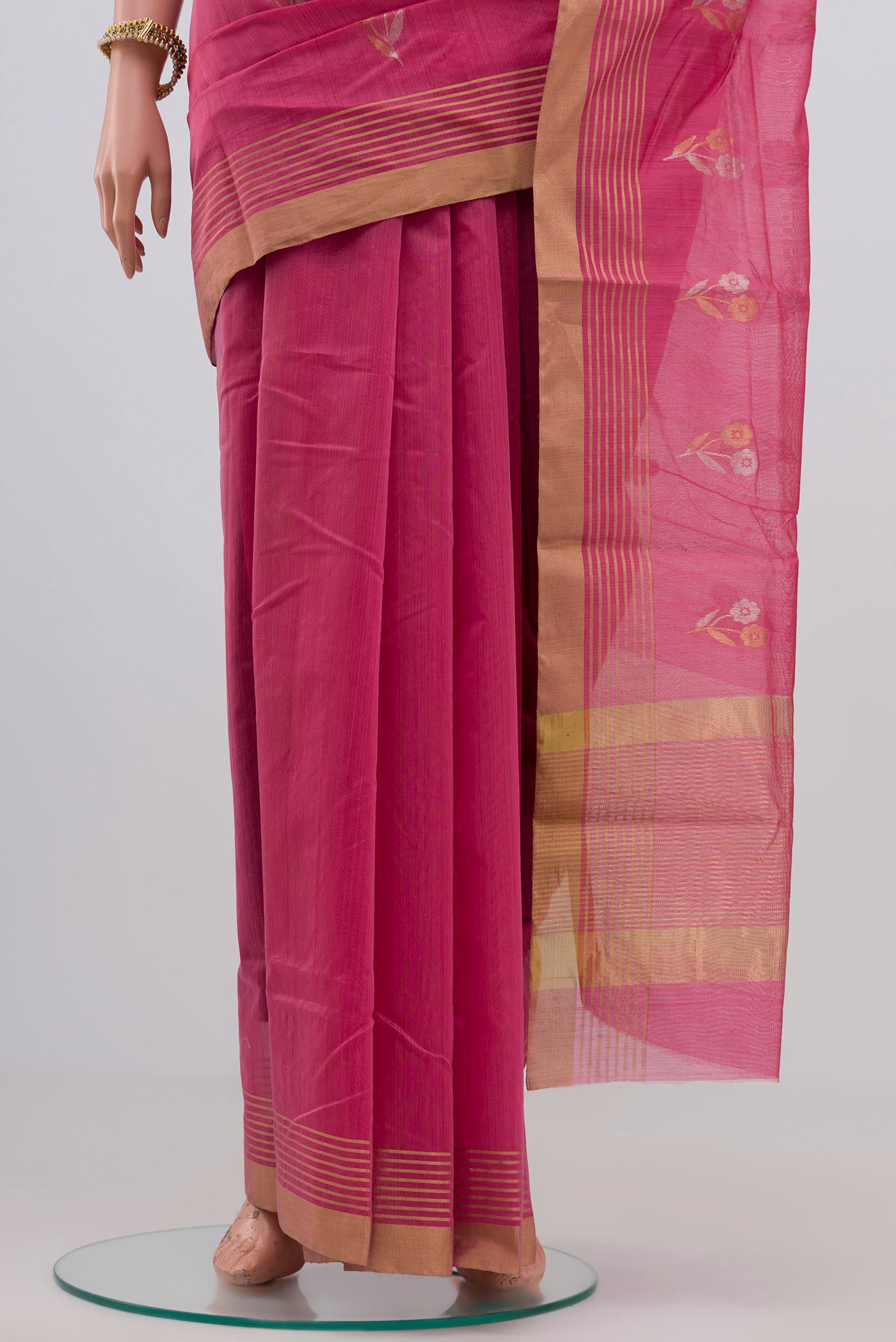 Pleats and pallu of Pink Chanderi Silk Cotton Saree with Zari Butta on the body and Zari Border. 