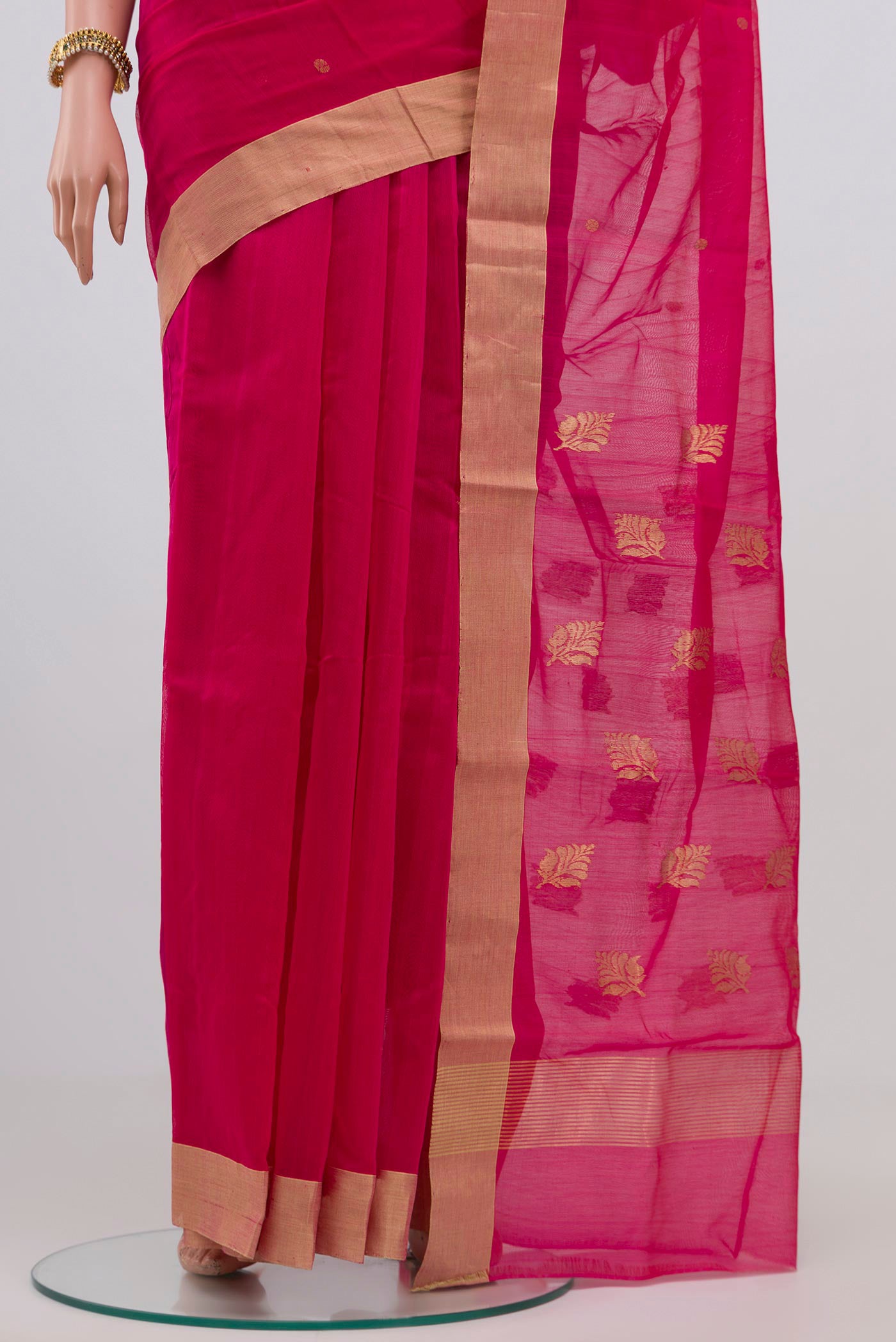 Pleats and pallu of Dark Pink Chanderi Silk Cotton Saree with Zari Butta on the body and Zari Border. 