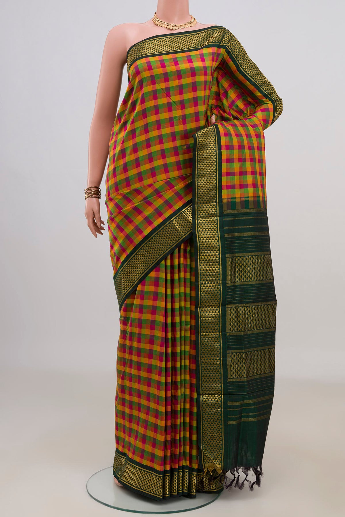 Pure Silk Multi Color Kanchipuram Nine Yards Saree with Checked design on the body and Zari Border.  displayed on a mannequin