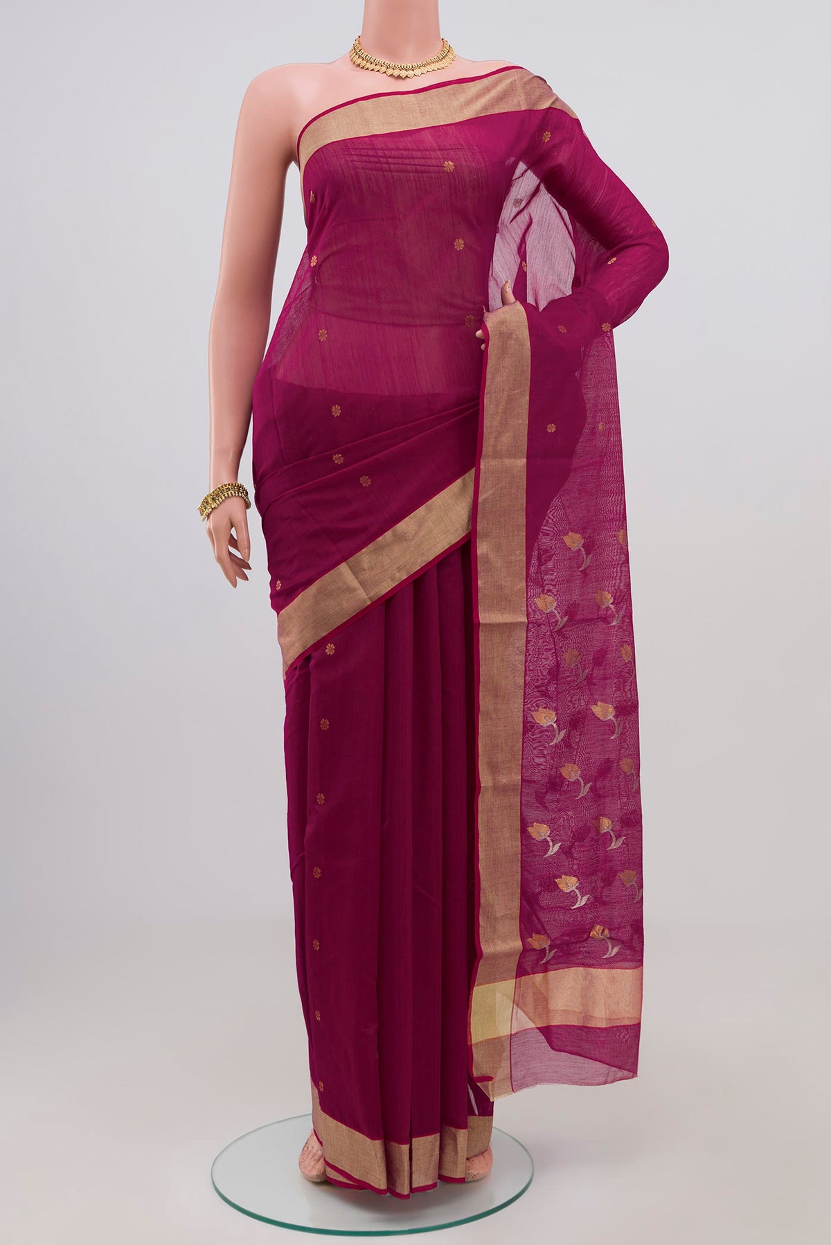 Purple Chanderi Silk Cotton Saree with Zari Butta on the body and Zari Border.  displayed on a mannequin