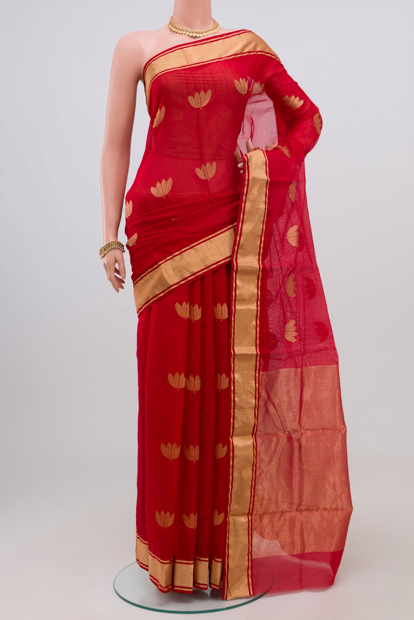 Red Chanderi Silk Cotton Saree with Zari Butta on the body and Zari Border.  displayed on a mannequin