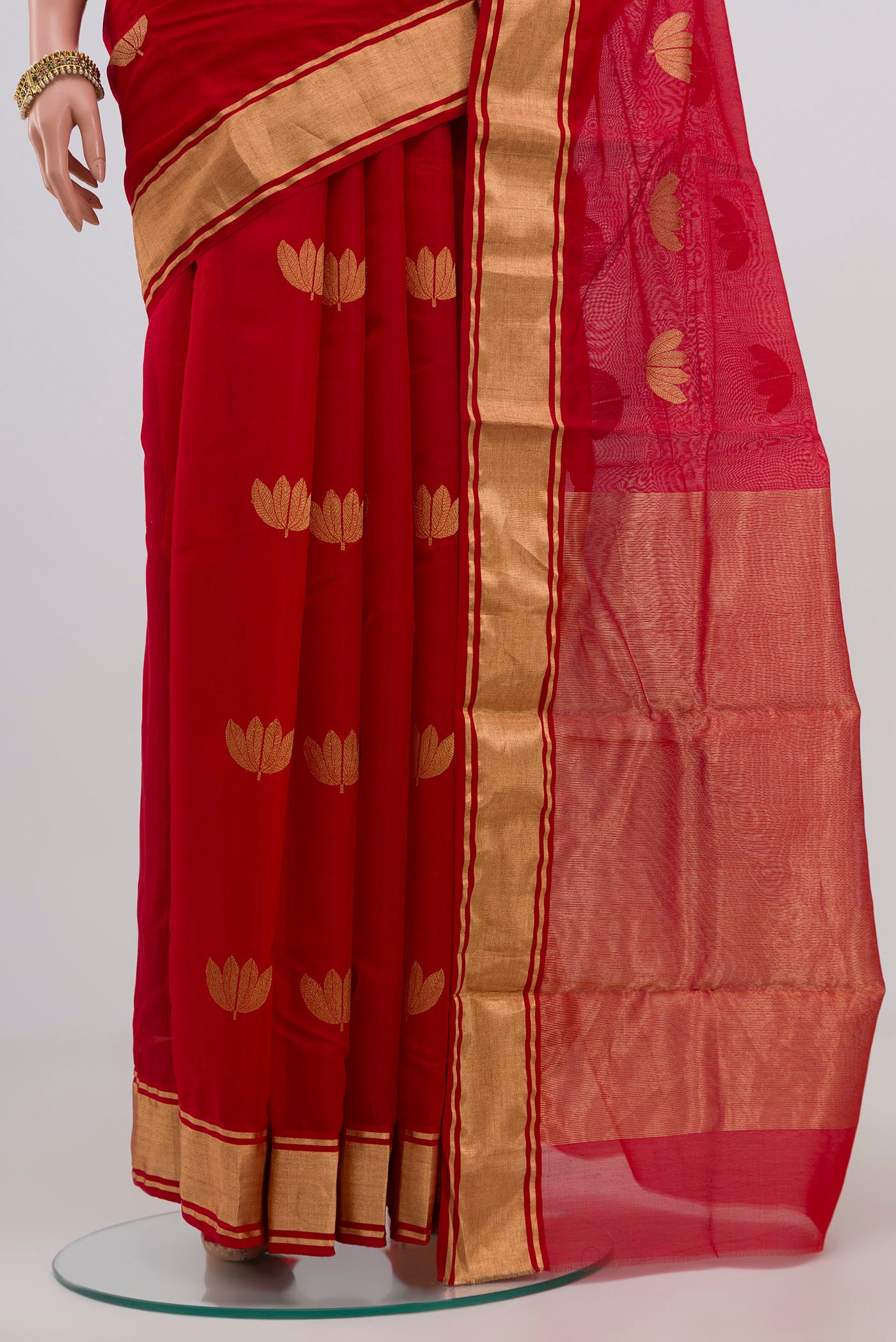 Pleats and pallu of Red Chanderi Silk Cotton Saree with Zari Butta on the body and Zari Border. 