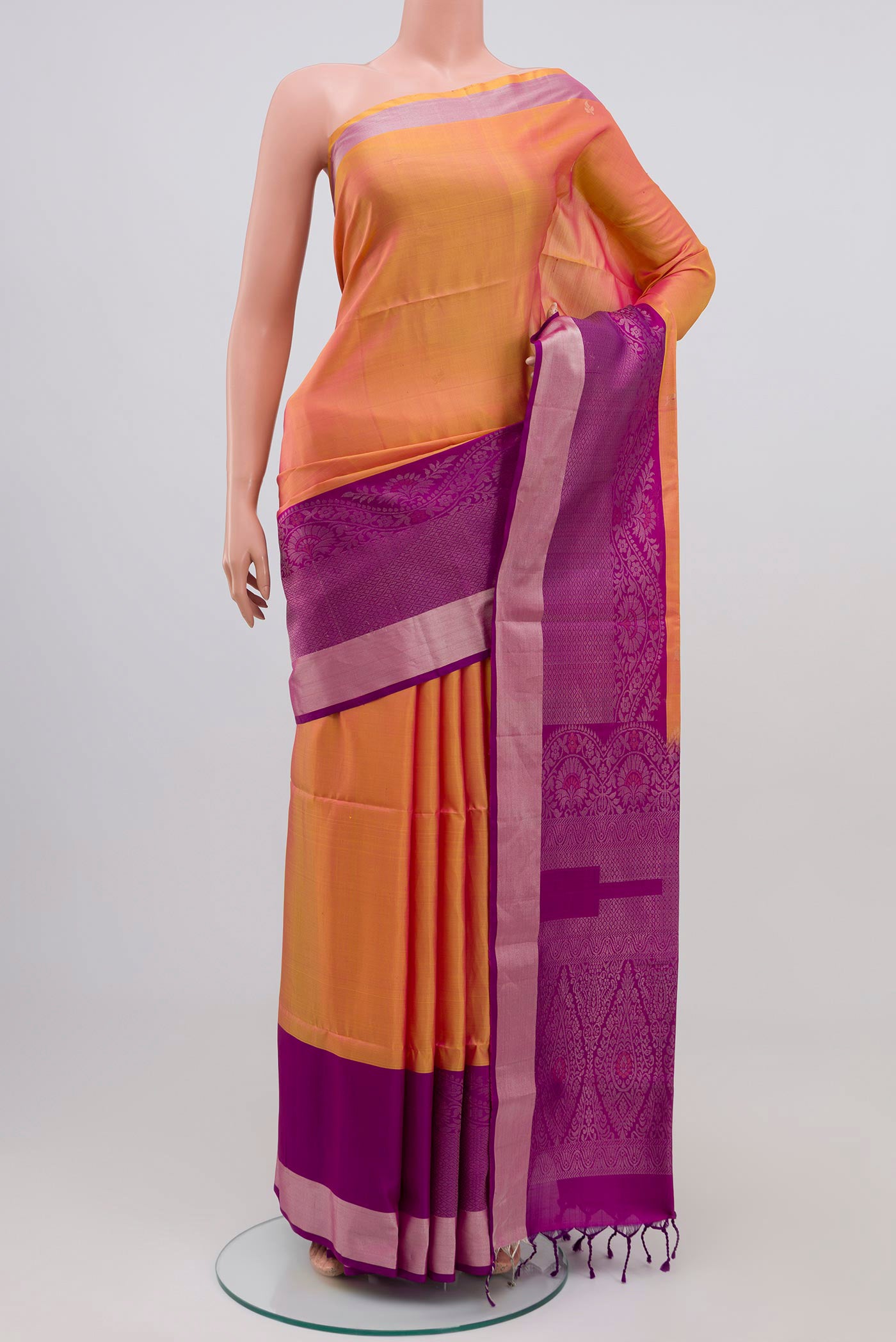 Yellow Coimbatore Silk Cotton Saree with Zari Butta on the body and Zari Border.  displayed on a mannequin