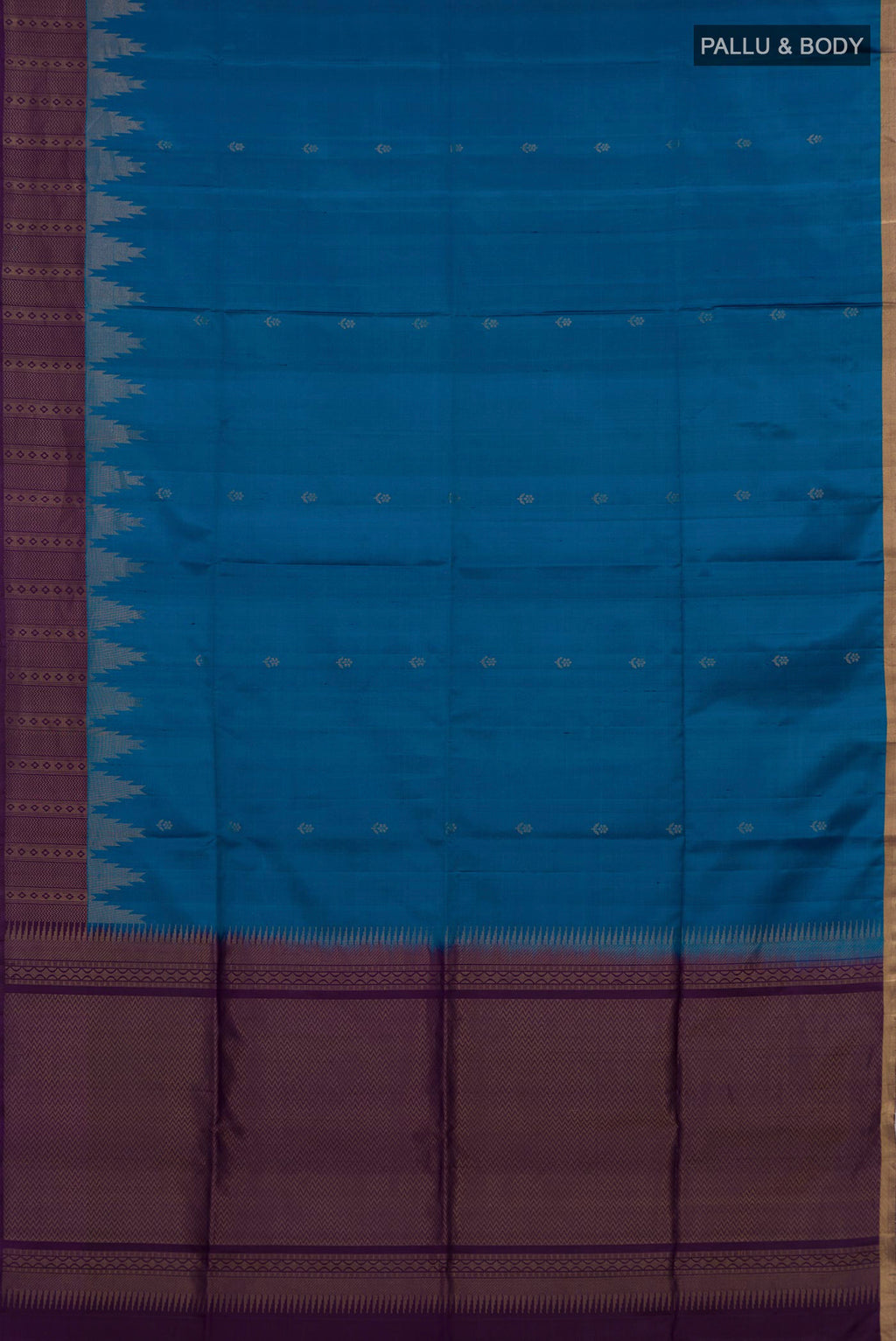 Flat view of Blue Soft Silk Saree with Zari Butta on the body and Fancy Border. 