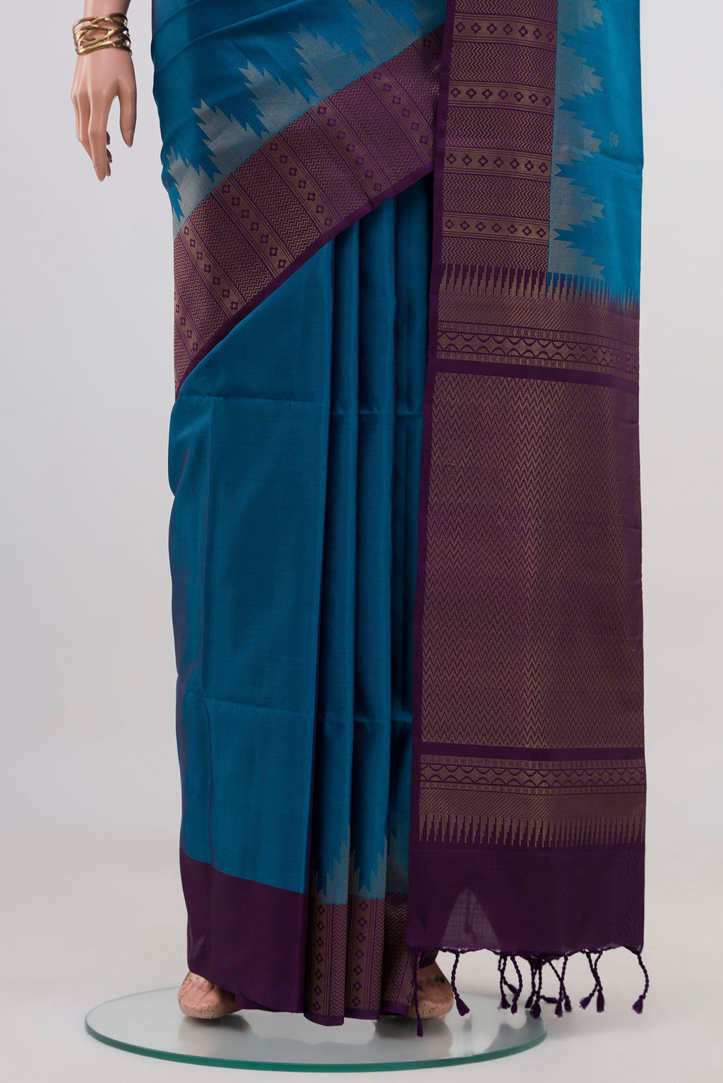Pleats and pallu of Blue Soft Silk Saree with Zari Butta on the body and Fancy Border. 