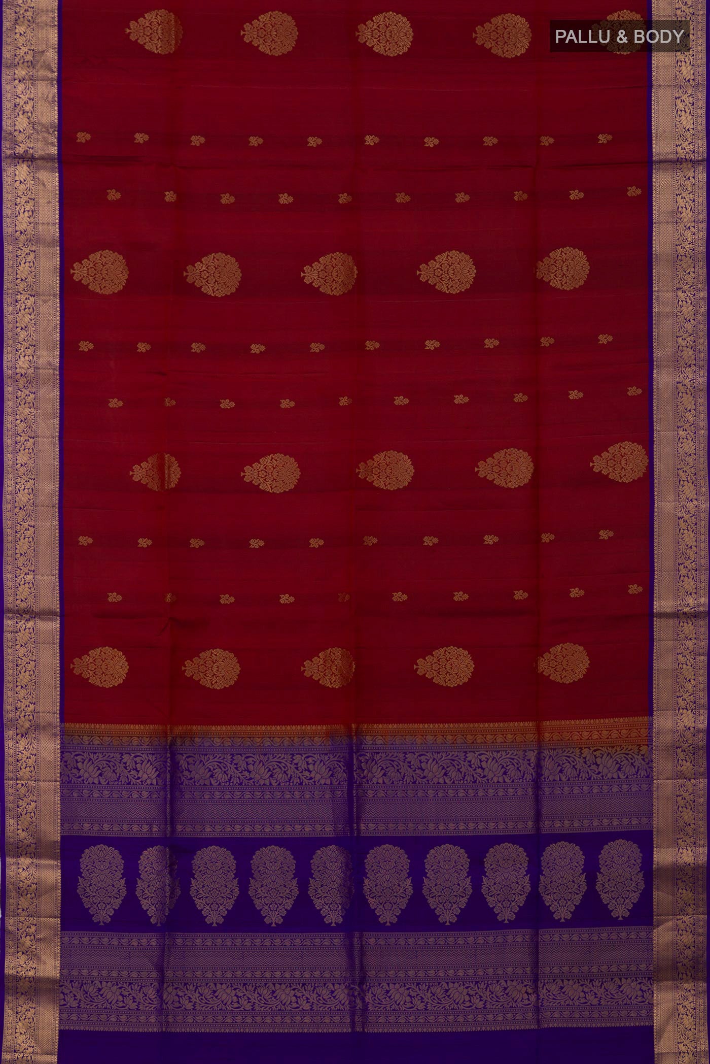 Flat view of Maroon Soft Silk Saree with Zari Butta on the body and Zari Border. 