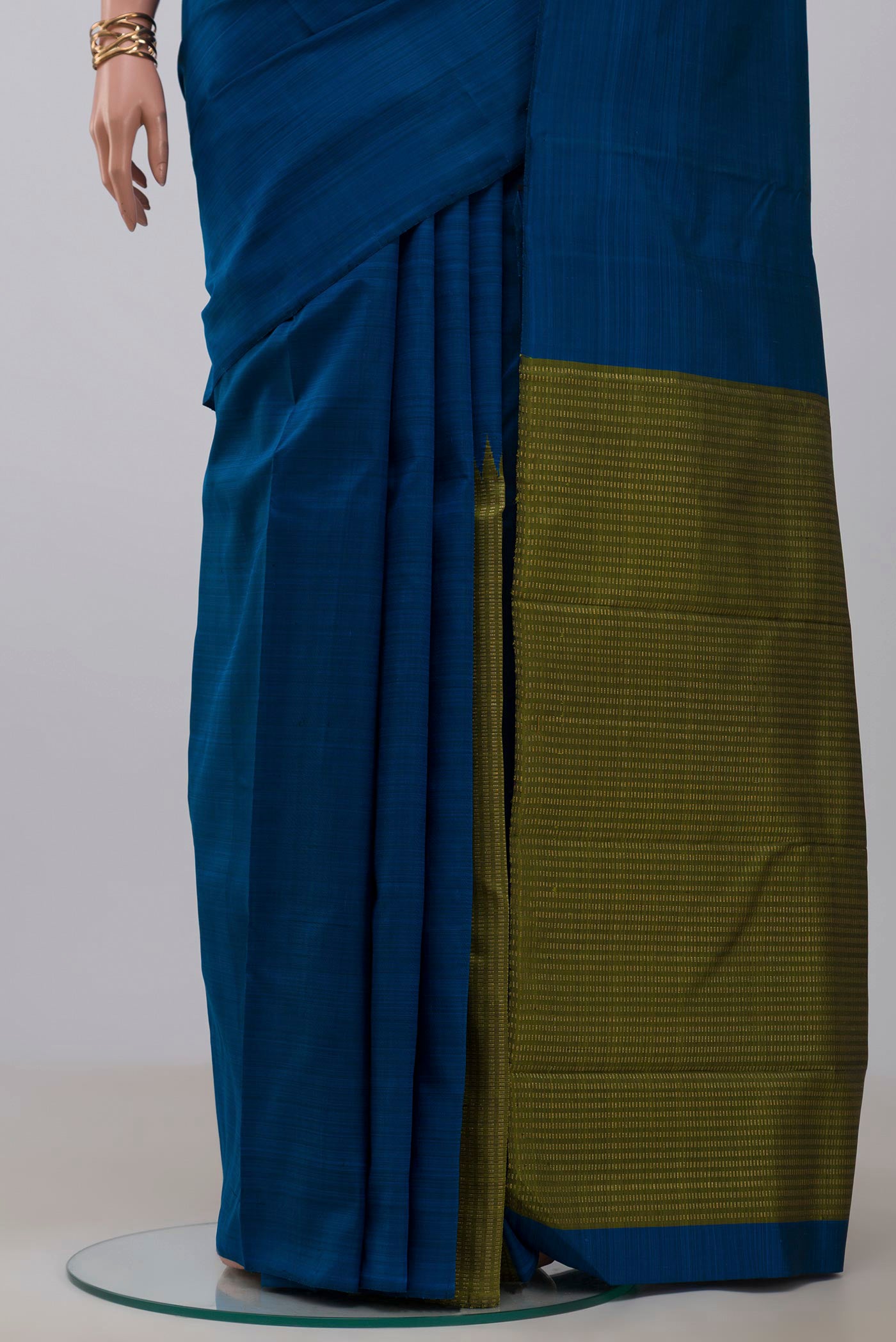 Pleats and pallu of Pure Silk Pure Zari Blue Kanjivaram Saree with Fancy on the body and Without Border. 