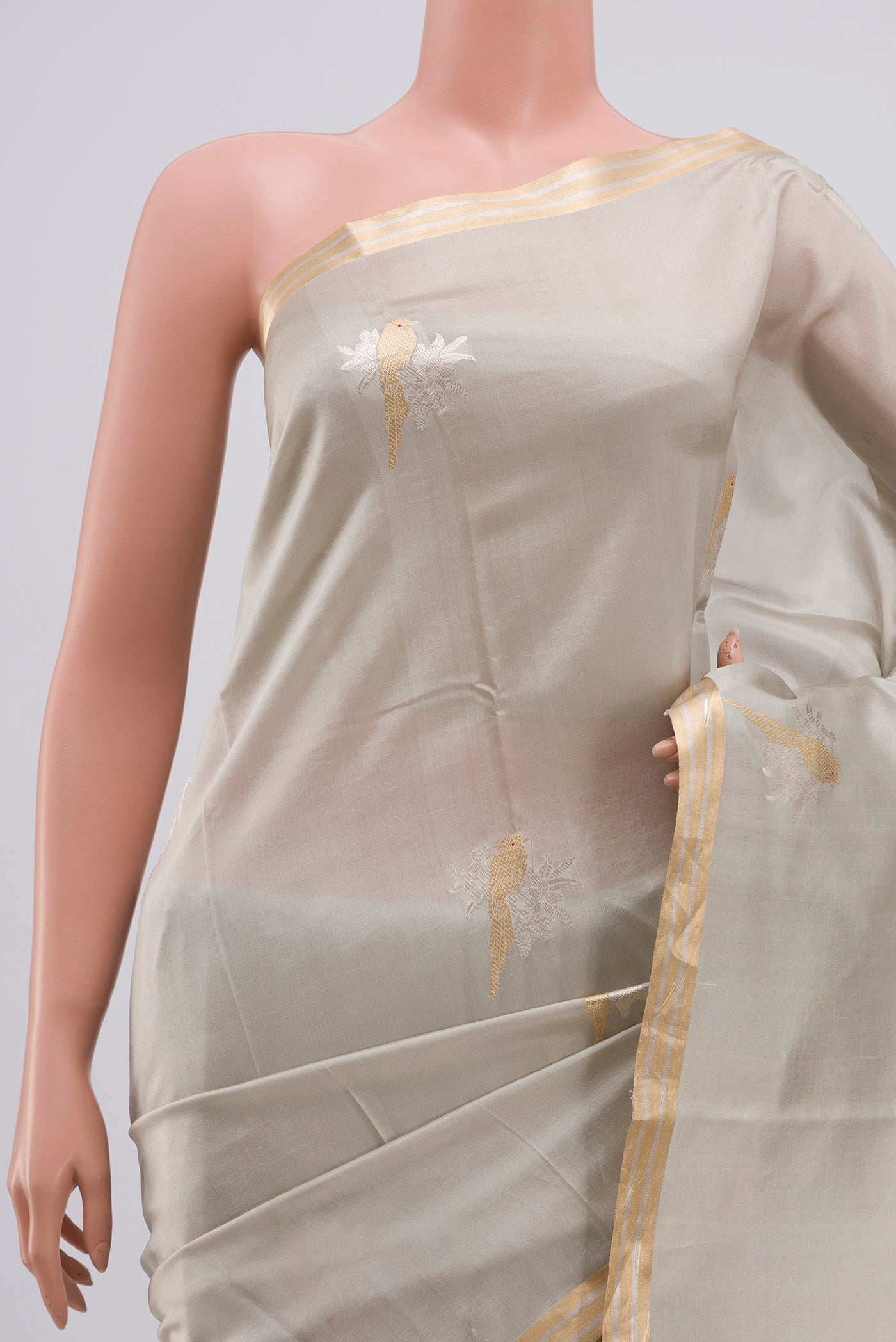 Border image of Grey Banarasi Katan Silk Saree with Zari Butta on the body and Zari Border. 
