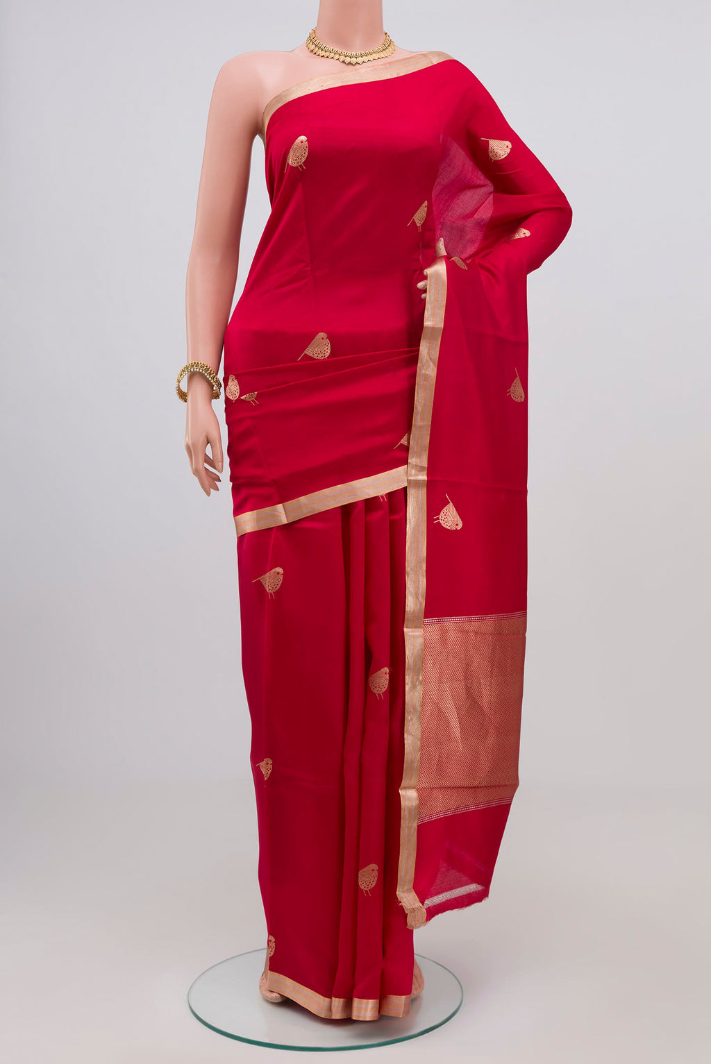 Red Banarasi Katan Silk Saree with Zari Butta on the body and Zari Border.  displayed on a mannequin
