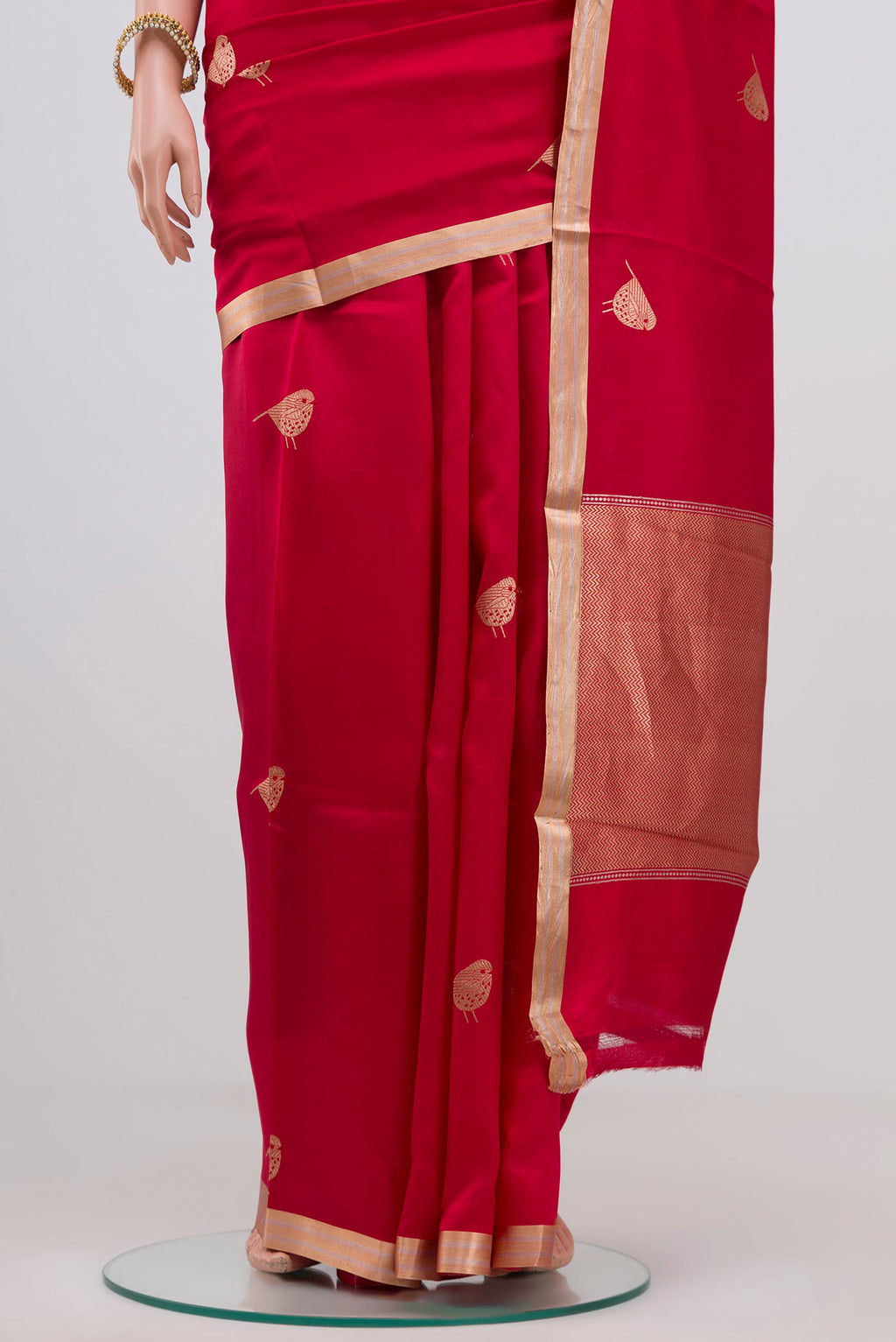 Pleats and pallu of Red Banarasi Katan Silk Saree with Zari Butta on the body and Zari Border. 