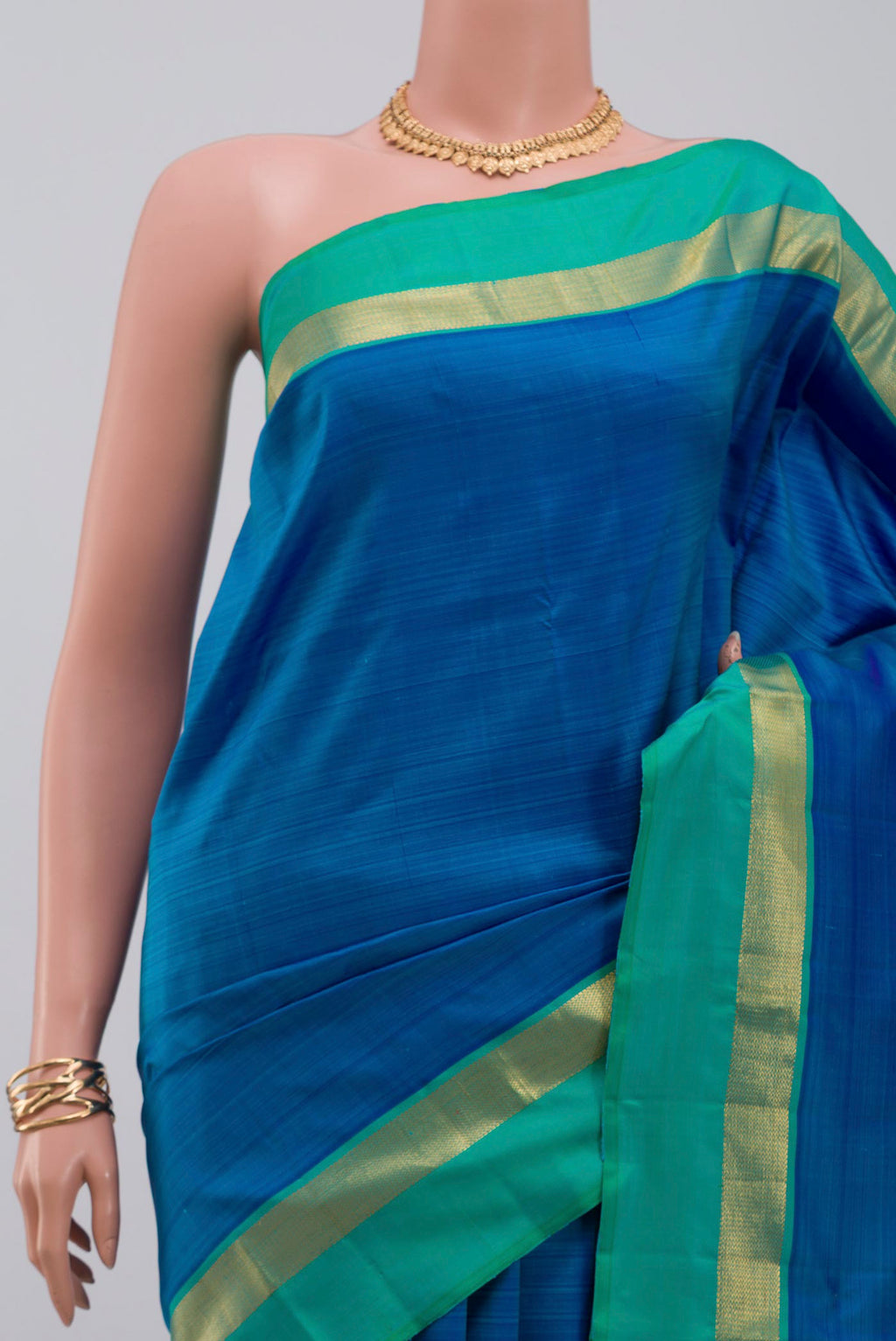 Border image of Pure Silk Pure Zari Blue Kanjivaram Saree with Plain Body and Zari Border. 