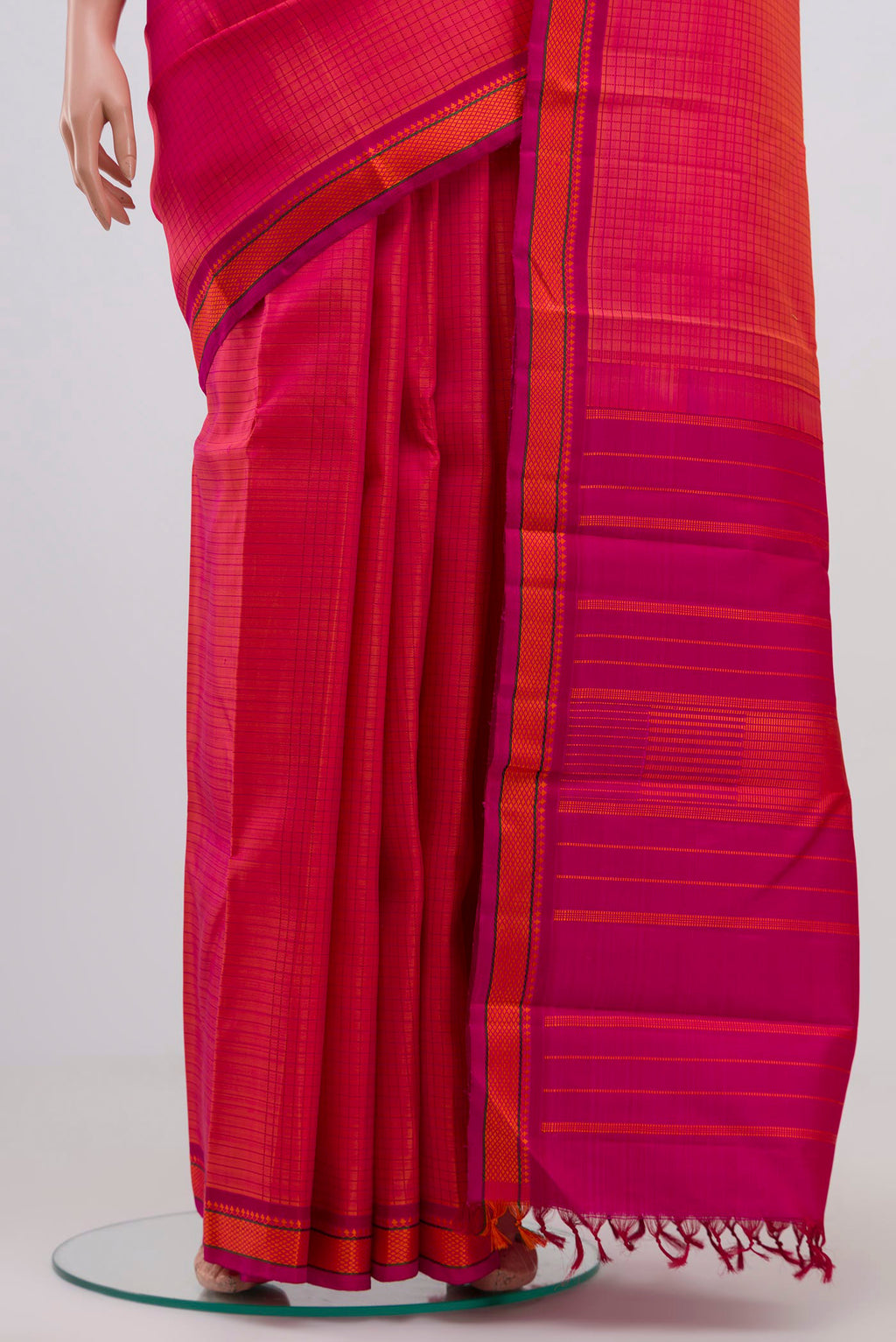 Pleats and pallu of Orange Dual Tone Kanjivaram Silk Saree with Thread Brocade on the body and Thread Border. 