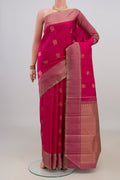 Pure Silk Pink Kanjivaram Saree with Zari Butta on the body and Thin Zari Line.  displayed on a mannequin