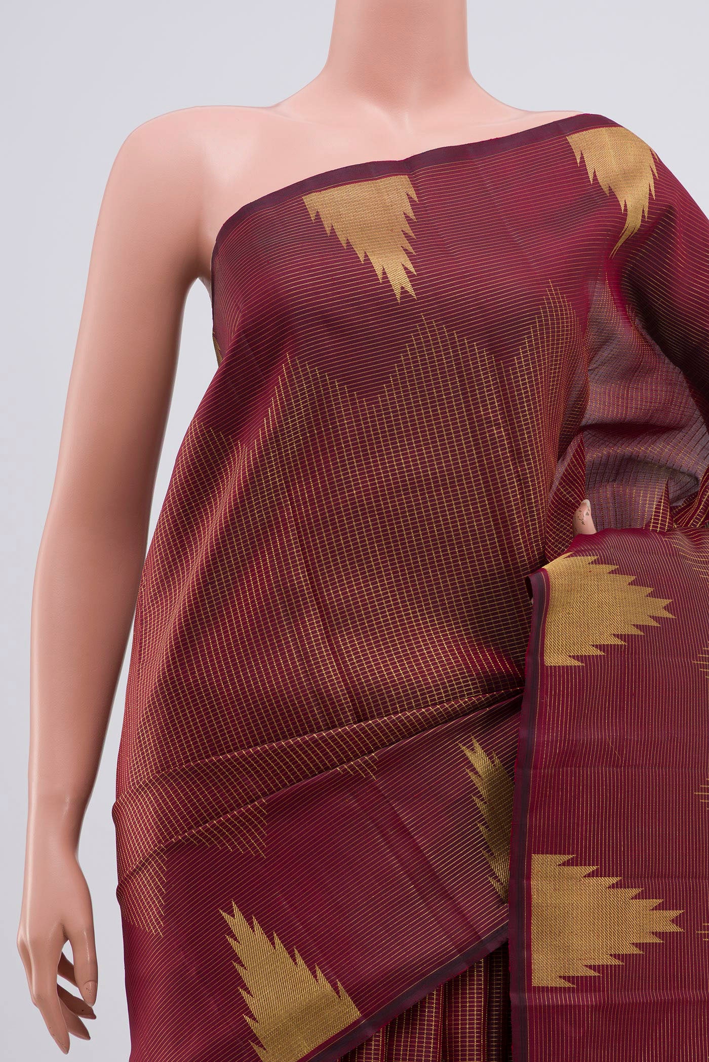 Border image of Maroon Kanjivaram Silk Saree with Zari Brocade on the body and Temple Border. 