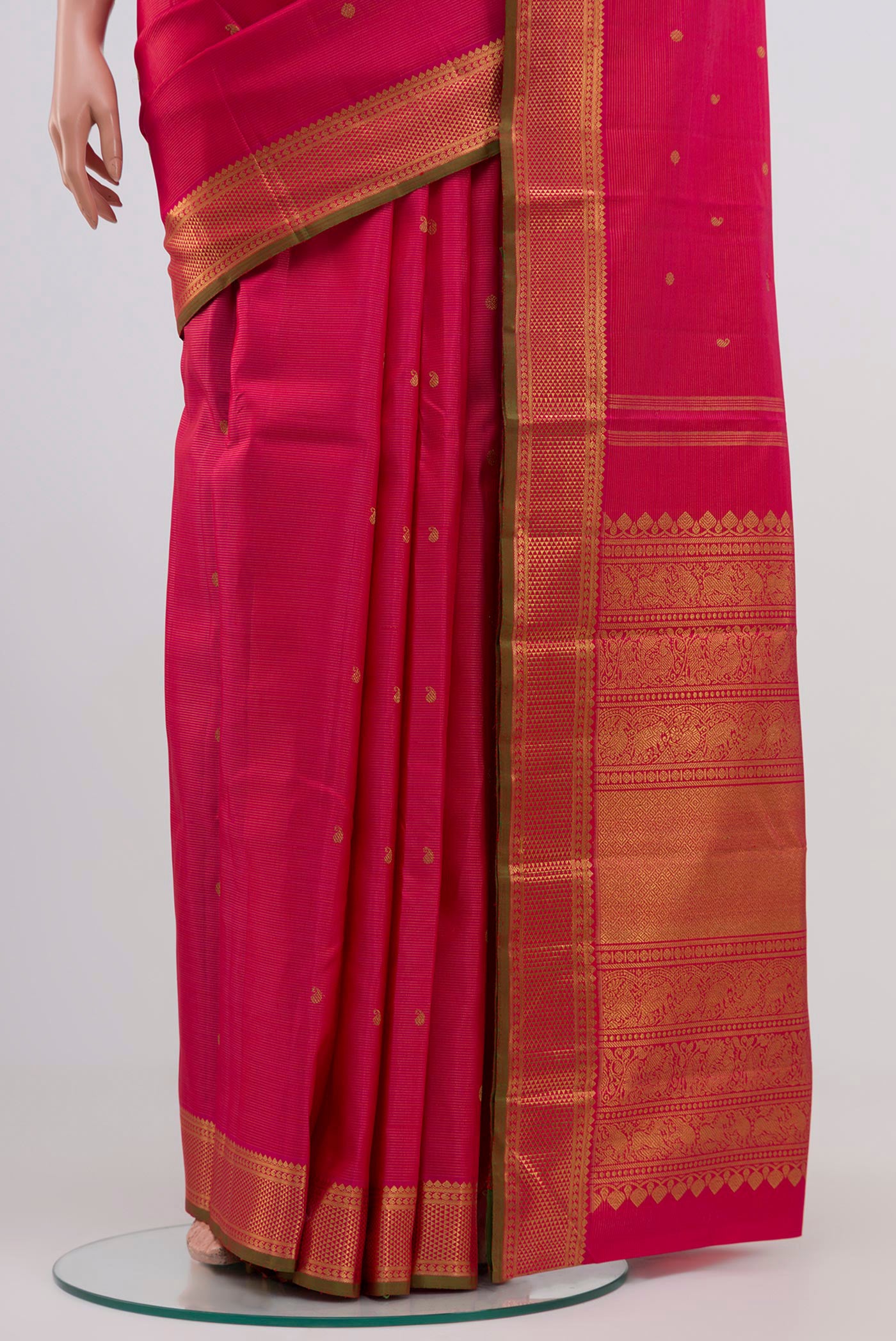 Pleats and pallu of Pure Silk Pure Zari Pink Kanjivaram Saree with Stripes on the body and Zari Border. 