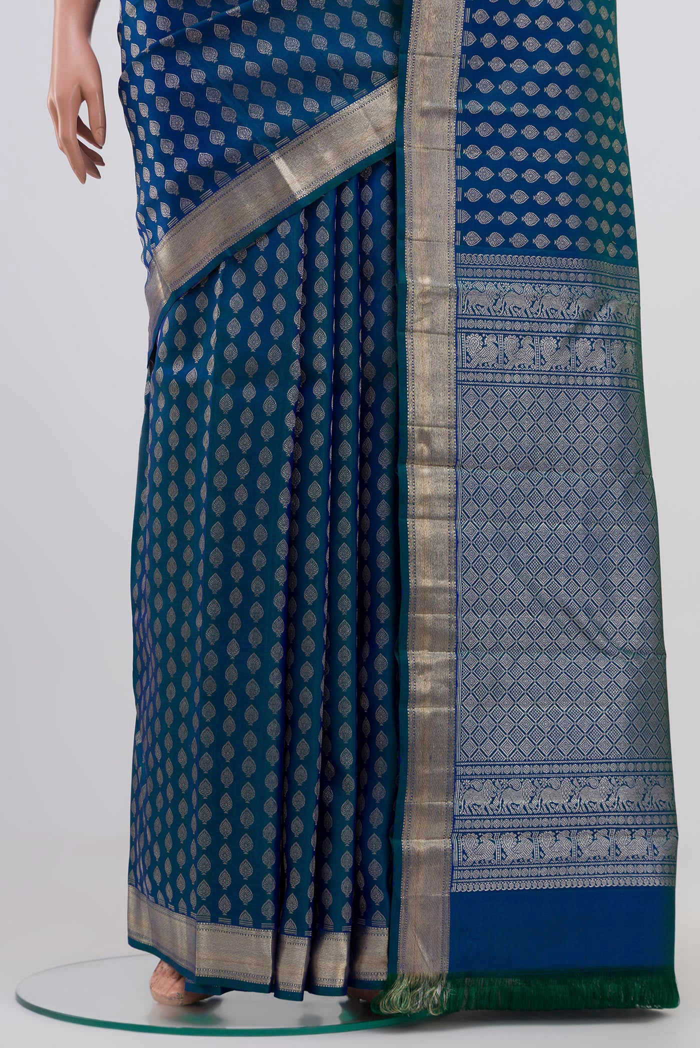 Pleats and pallu of Pure Silk Pure Zari Blue Dual Tone Kanchipuram Saree with Zari Brocade on the body and Zari Border. 