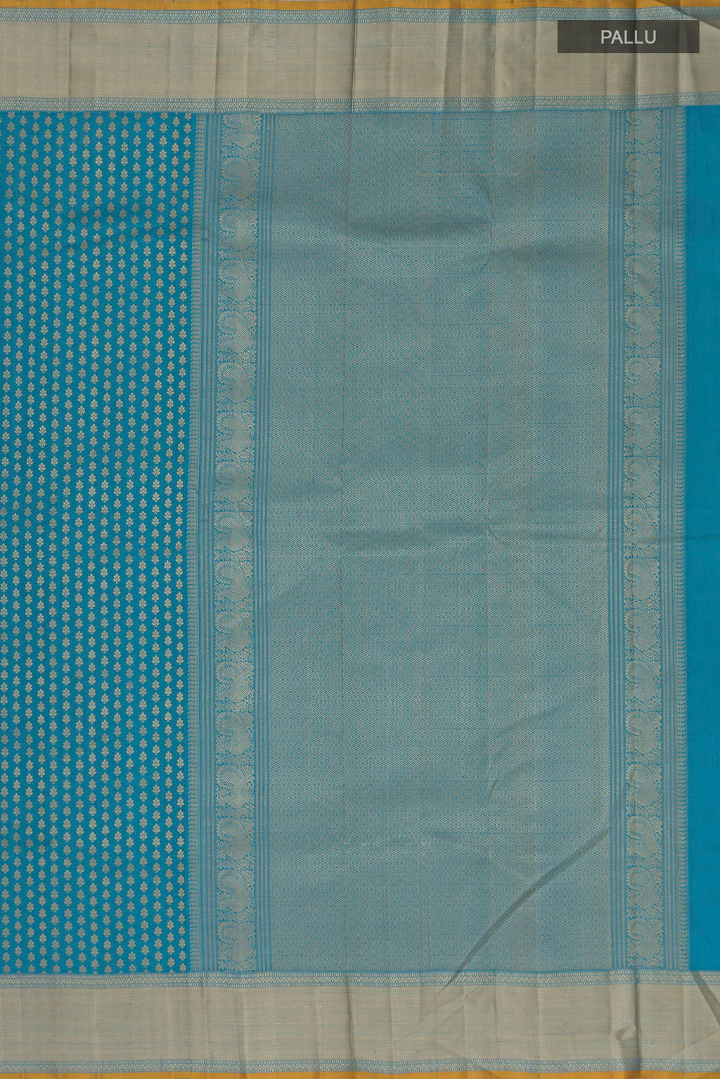 Close up image of the pallu of Blue Kanchipuram Silk Saree with Thread Butta on the body and Thread Border. 